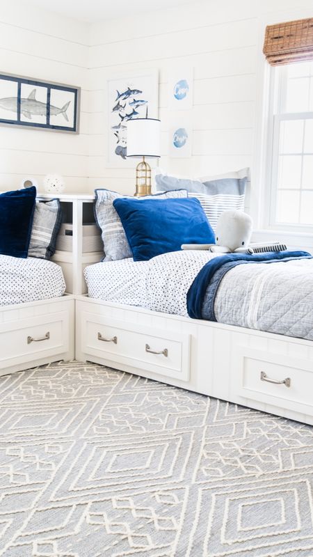 Shared little boys bedroom with Pottery Barn storage beds, blue and white bedding, nautical themed, shark decor, coastal style home decor kids bedroom

#LTKhome #LTKkids #LTKfamily