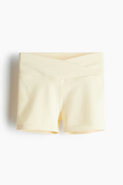 H & M - Short sports cycling shorts with SoftMove - Yellow | H&M (UK, MY, IN, SG, PH, TW, HK)