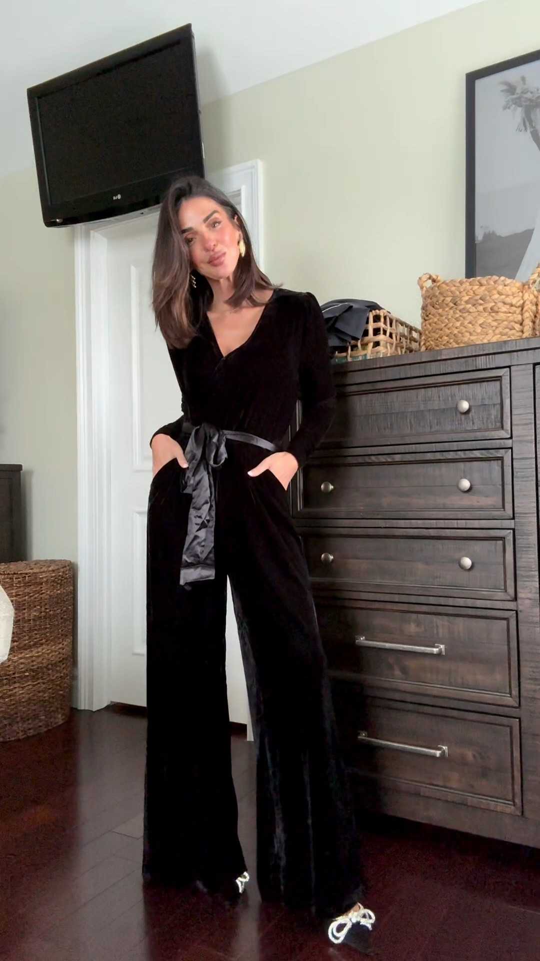 This velvet jumpsuit is perfect for holiday parities. Comes in both black and red. Wearing size extra small. Use code SARAL30 

#LTKHoliday #LTKPetite #LTKSeasonal