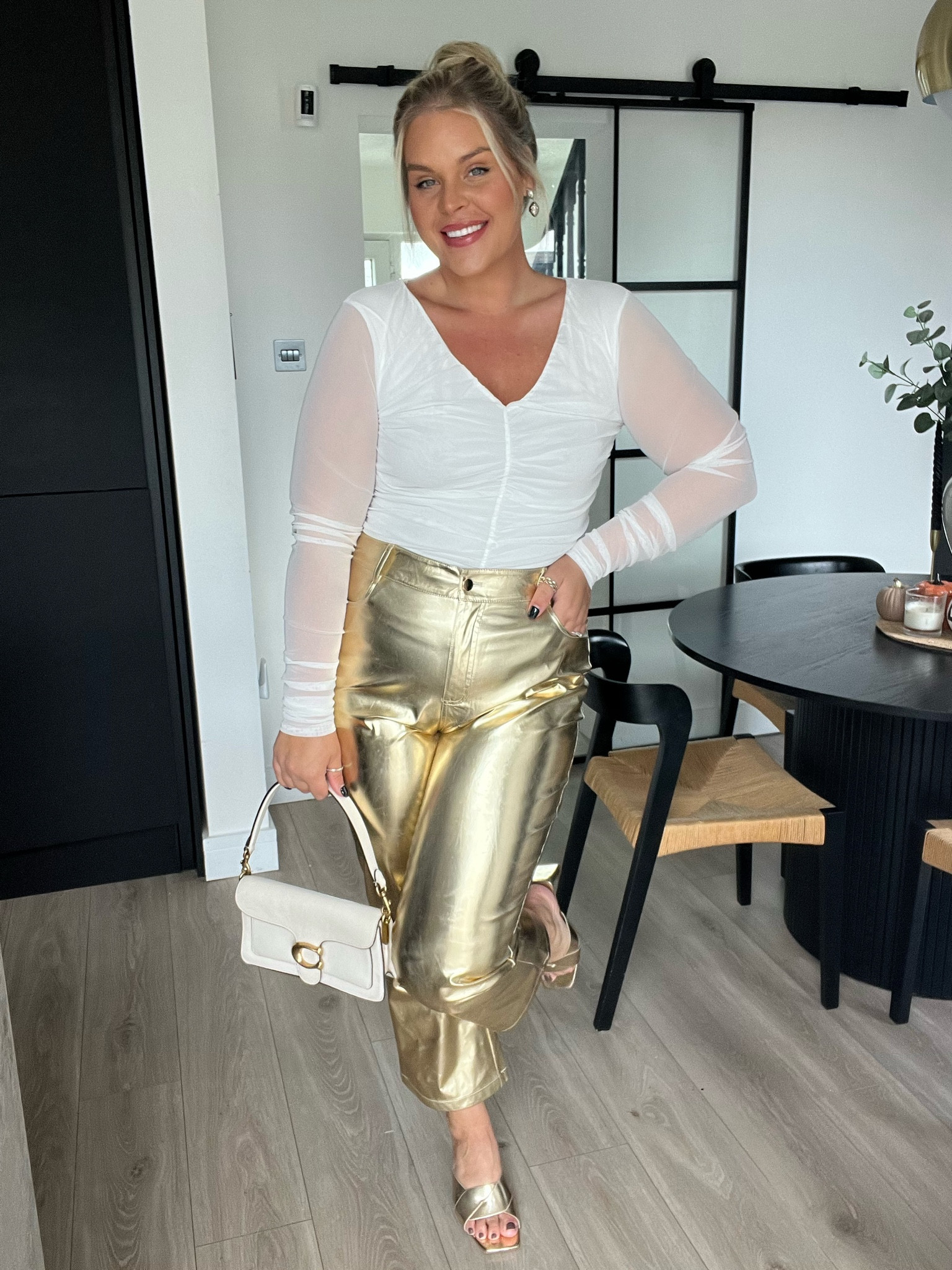 Sparkle season is here! Metallic trousers. Gold trousers. Christmas outfit. New Year’s Eve outfit. NYE style. Winter fashion. Christmas night out. Cream top. Long sleeved top. Coach bag. Quiz clothing. Primark shoes. 

#LTKSeasonal #LTKeurope #LTKmidsize