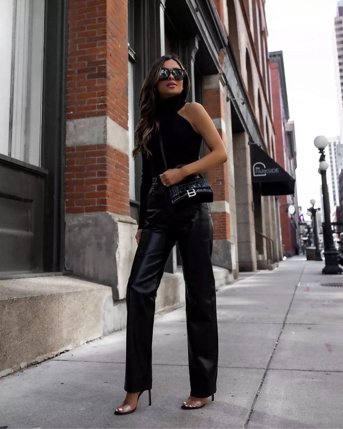 fashion blogger mia mia mine wearing a prada cahier bag