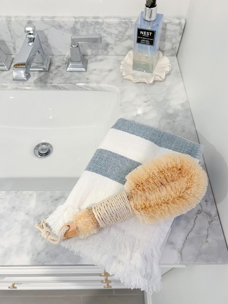 These organic cotton hand towels are the absolute best, and currently on clearance for just $10 with free shipping! I've purchased about half a dozen of them over the last few years for our bathrooms and they are are so soft! Full size bath towels also on clearance for $15!
-
coastal bathroom decor, coastal style, coastal home decor, organic cotton bath towels, organic towels, cotton hand towels, cotton bath towels, towels on sale, crate & barrel towels, blue and white bath towels, soft towels, amazon bath brush, exfoliating bath brush, NEST hand soap, bathroom hand soap, sea salt soap, soap dish

#LTKhome #LTKsalealert #LTKfindsunder50