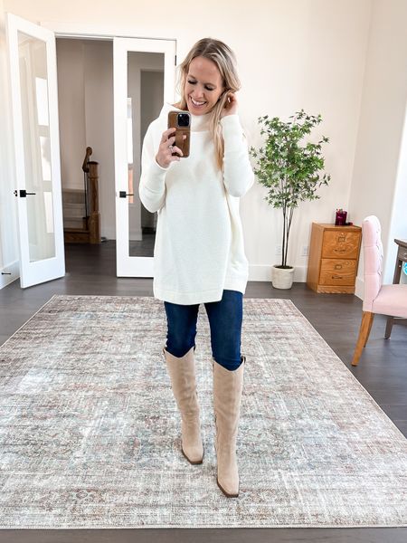Oversized sweater paired with jeans and knee-high boots

#LTKFind #LTKxNSale #LTKsalealert