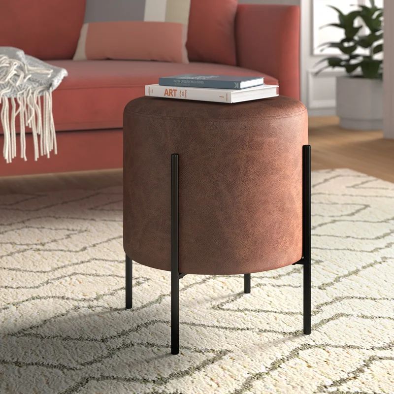 Degregorio 16'' Wide Faux Leather Round Solid Colour Standard Ottoman | Wayfair North America