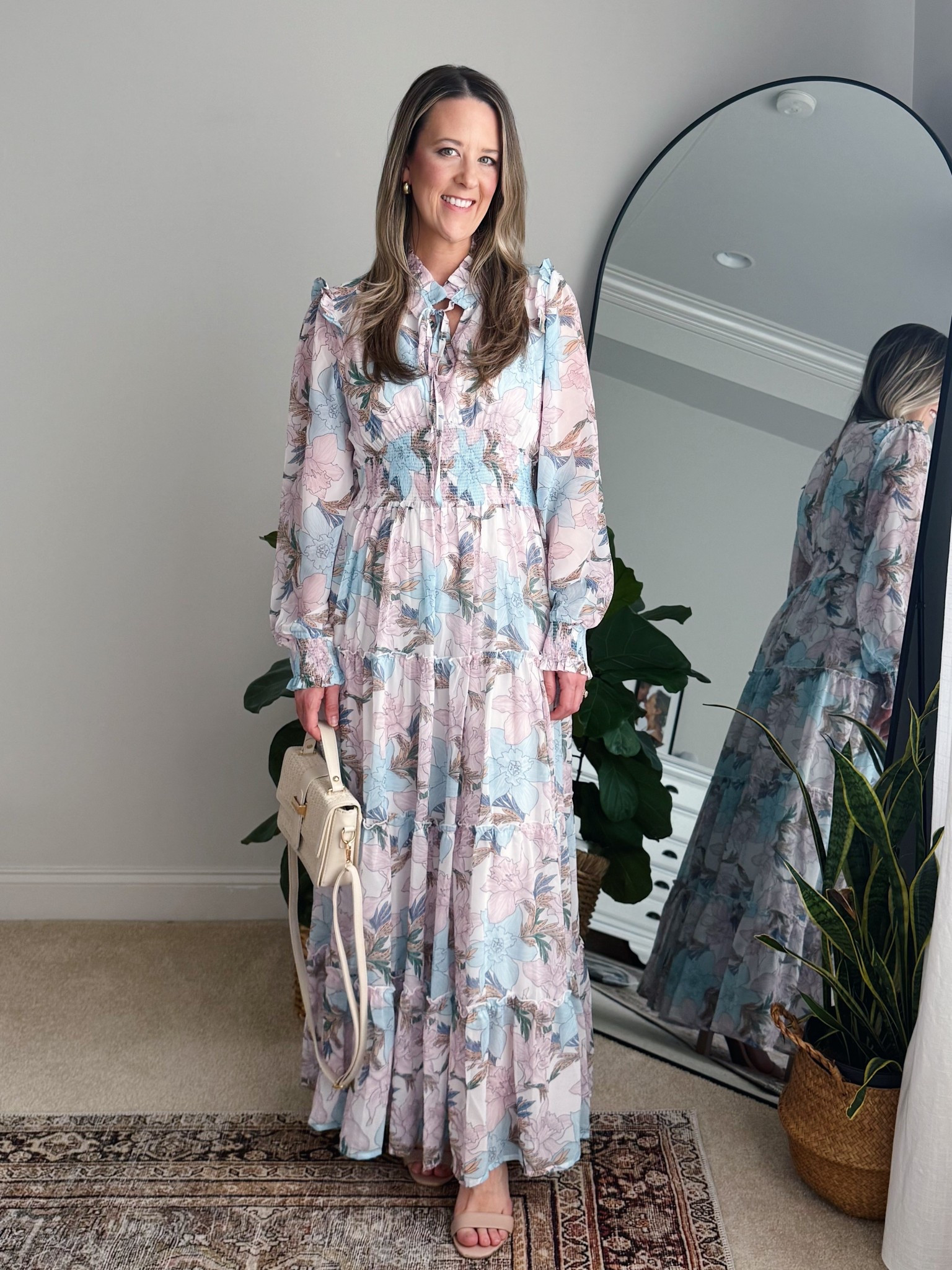 Modest Easter dress + spring wedding guest dress 🌸

If you’re looking for a long sleeve Easter dress, a modest spring wedding guest dress, or a feminine church outfit that feels timeless — this floral maxi is stunning.

The smocked waist gives shape without clinging, the pastel florals are perfect for spring family photos, and the lightweight fabric makes it comfortable for all-day wear.

Perfect for:
• Easter Sunday dress
• Spring wedding guest outfit
• Garden party dress
• Baby shower dress
• Bridal shower look
• Mother’s Day outfit
• Spring family pictures

Styled with neutral heeled sandals and a classic ivory bag for a soft, romantic finish.



#LTKSeasonal #LTKWedding