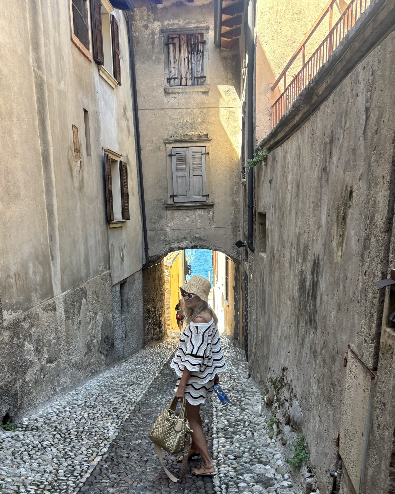 Lake Garda at Malcesine and Riva del Garda.  Beautiful landscape, freezing lake haha! 

#LTKFamily #LTKTravel #LTKStyleTip