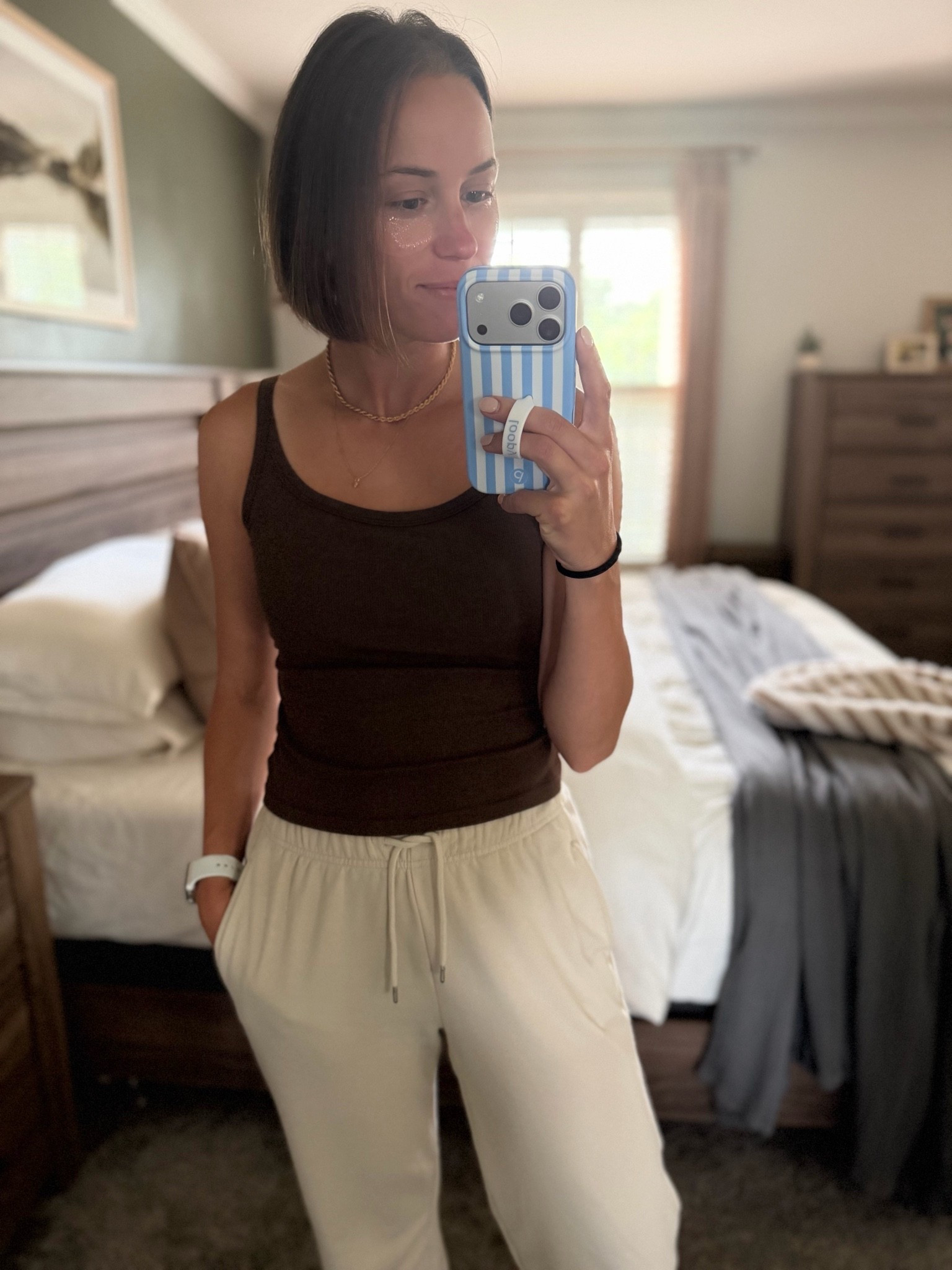 Grabbed this bra free tank in white and this beautiful chocolate brown color. I love the cut of it—not too low and I like how the tank is cut high on the sides leading into the strap. Wearing a size S. Great for wearing as loungewear but would also be great for layering.

#LTKootd #LTKmomlife