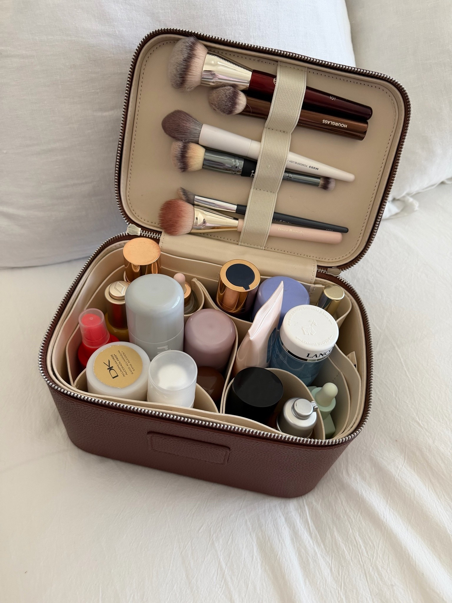 Vanity case holds everything securely for travel 🤎

#LTKTravel