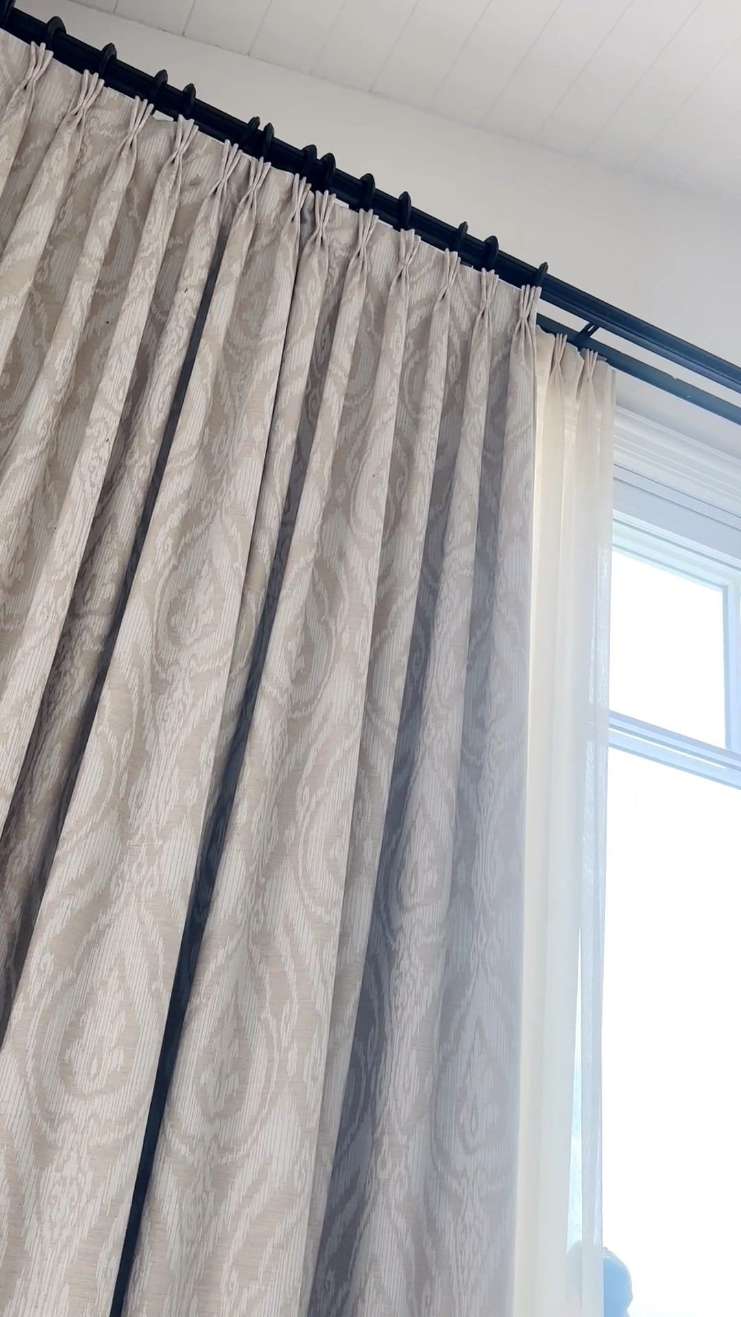 Imagine waking up here—soft morning light, an ocean view, and beautifully tailored window treatments framing the moment. ✨

The French pleated drapes create such an elegant, sophisticated silhouette, layered with sheer panels to gently filter the sunlight while keeping the room airy and serene. Finished with a classic curtain rod, this combination adds softness, height, and timeless refinement to the entire space.

A beautiful reminder that the right drapery doesn’t simply frame a window—it transforms the room.

#LTKHome #WindowTreatments #FrenchPleatedDrapes #SheerCurtains #CurtainRod #LuxuryInteriors #ElegantHome #CoastalInteriors #Drapery #InteriorDesign

#LTKdayinmylife #LTKHome