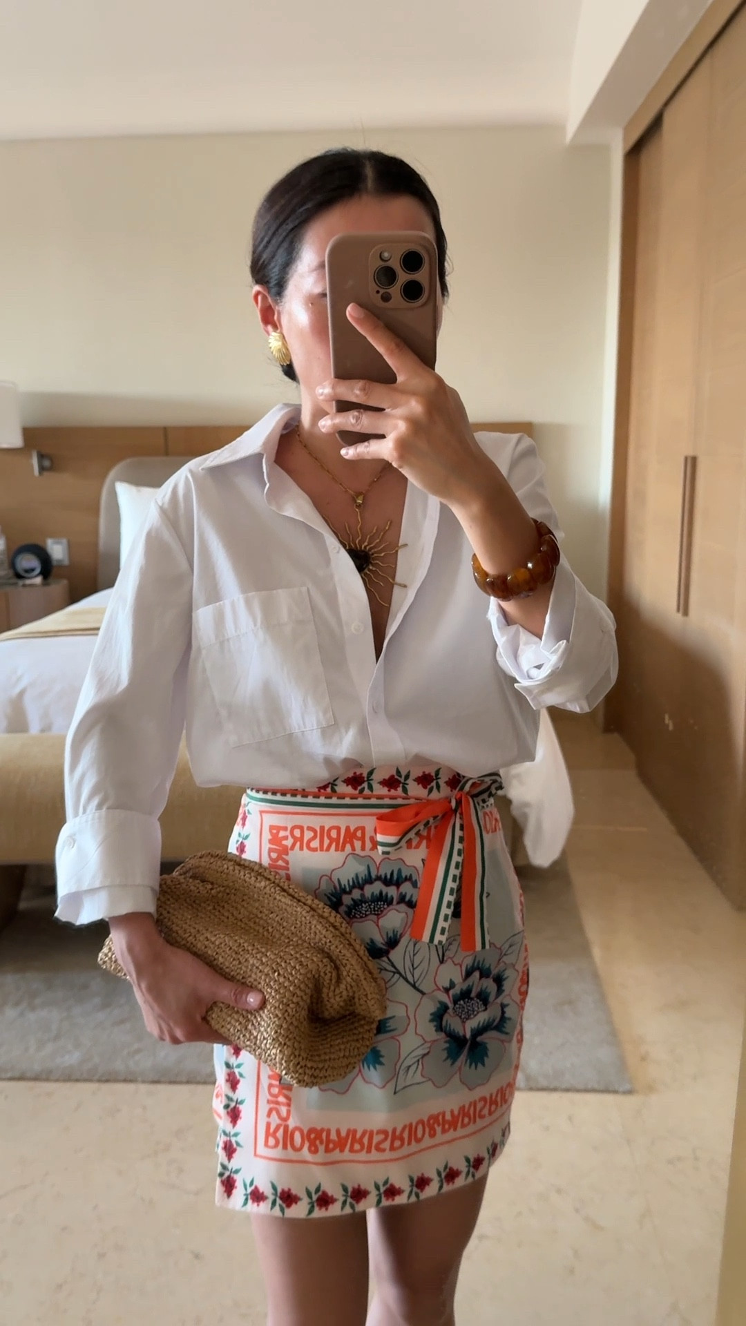 Skirt on sale! Easy vacation outfit 
• $25 tie wrap skirt XS from Amazon. TTS and lots of prints

• Madewell white button down shirt xxs

• Marc Fisher strappy sandals 5.5, TTS

• J.crew woven clutch roomy with super easy magnetic closure 

• sezane stretch bracelet , vintage seashell earrings 

• necklace from a shop in Santa Fe 

Swimsuit, beach dinner , resort wear , vacation style , mom friendly looks #ltktravel #ltkpetite

#LTKootd #LTKTravel #LTKPetite