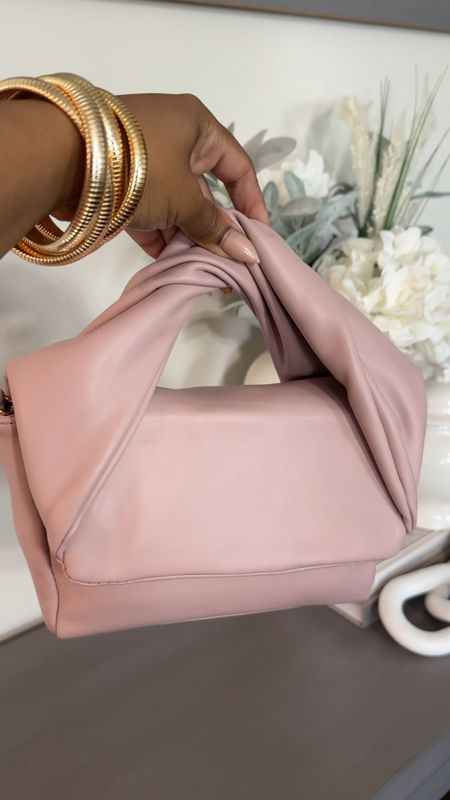 Cute Bag for Spring. It’s a blush & lilac color. Comes with crosssbody chain strap.  Wearing two sets of the bangles 

#LTKStyleTip #LTKItBag #LTKMidsize