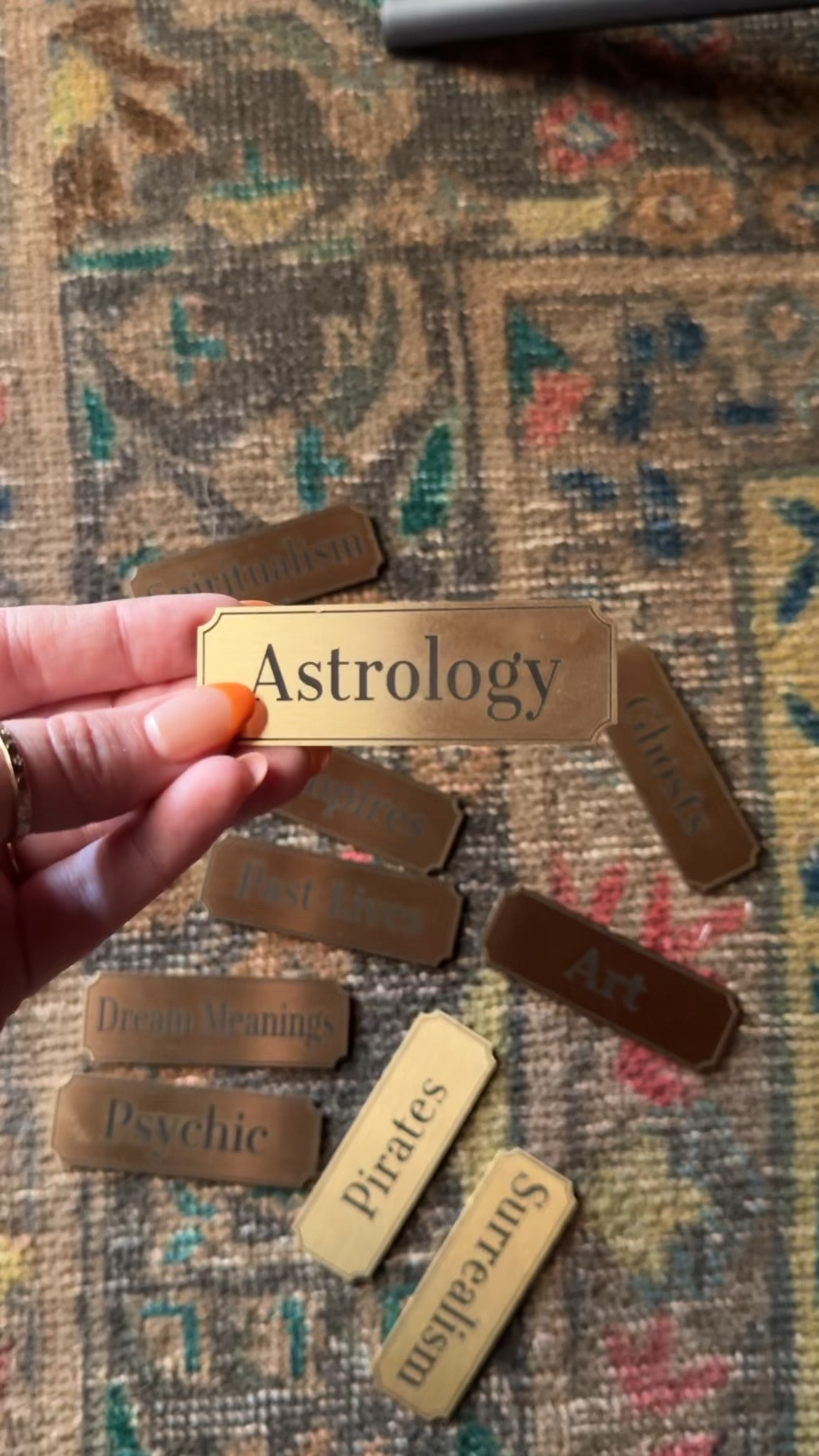 Custom brass labels for our library shelves. They are self adhesive. 

#LTKHome