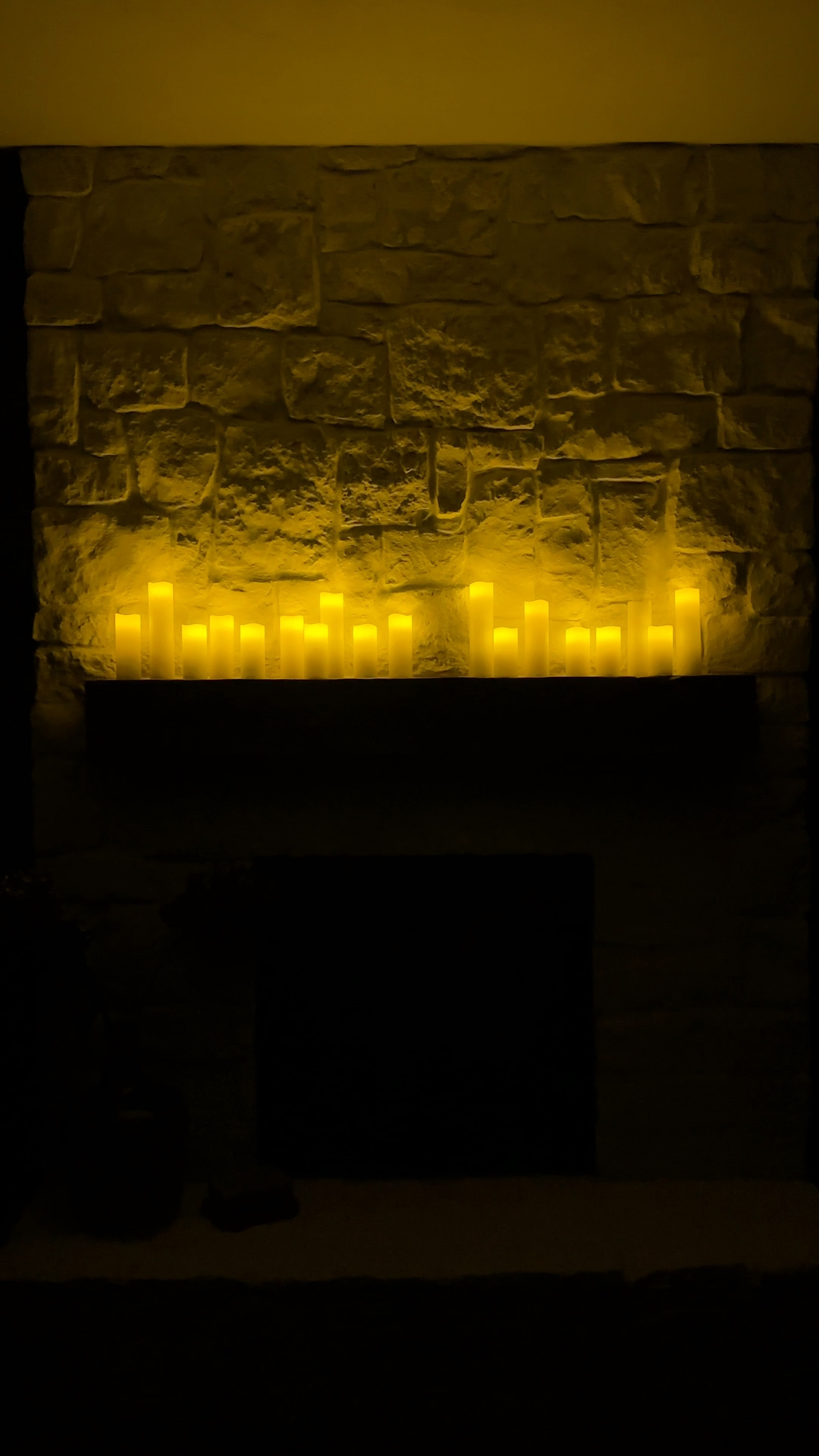 Got the base layer for my holiday mantle! I’m going to nestle some greenery between the candles. You can get so many for so cheap! Major #BlackFriday deal on #Amazon. 

#LTKCyberWeek #LTKHoliday #LTKHome