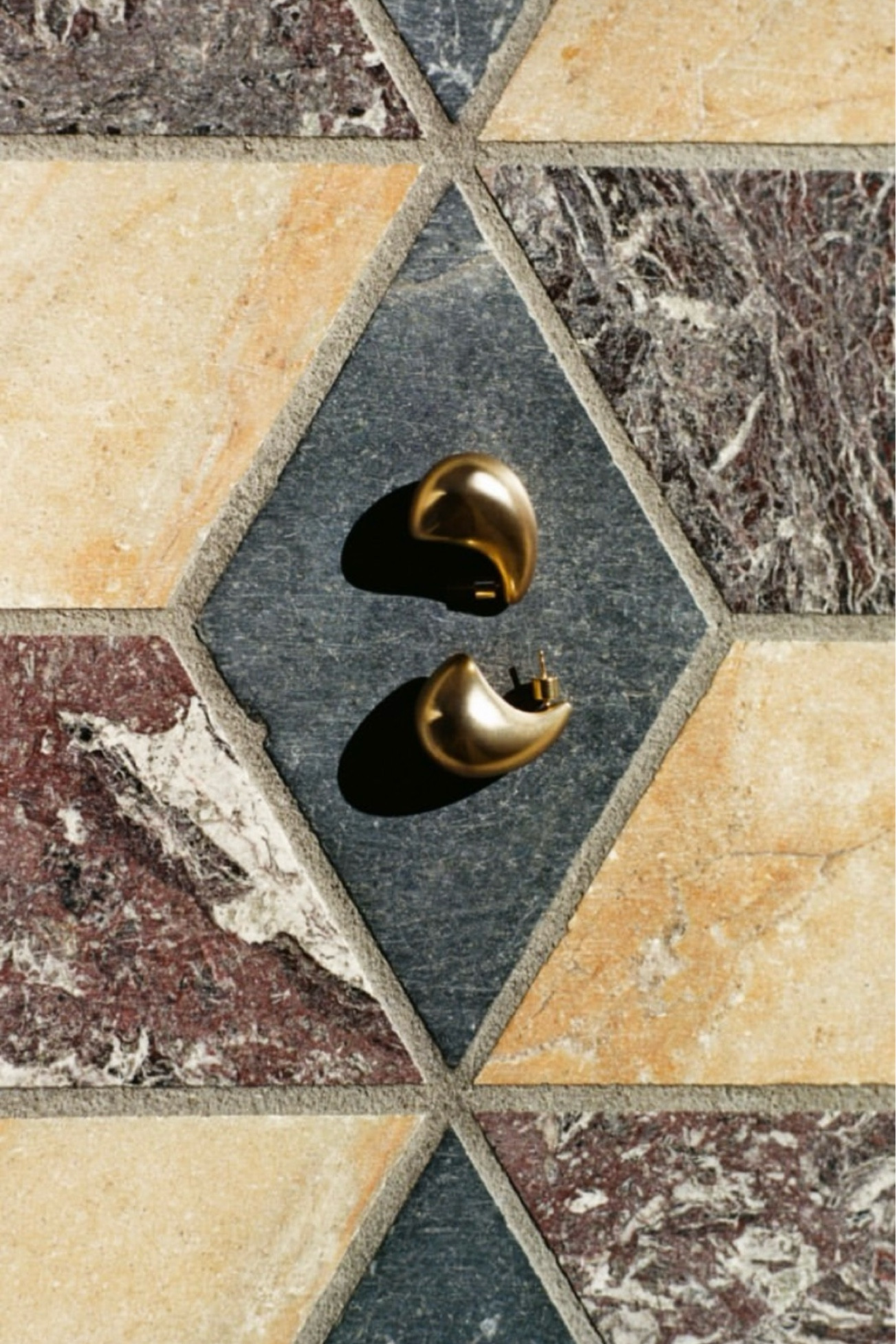 Are we still in love with chunky drop earrings? 
Bottega Veneta introduced their super popular oversized drop earrings a few years back and the trend is still going strong which is pretty amazing! I refuse to buy any gold plated (or vermeil) jewelry for anything over $100 so I’ve been patiently waiting for someone to create a pair of drop earrings in solid gold and I just found a stunning looking pair at Ross Simons! 
For everyone who still doesn’t want to pay anything over $100 there a beautiful pair of oversized drop earrings by Cos and Mejuri (in sterling silver and gold vermeil variations). 
What do you think? 

#LTKFindsUnder100 #LTKSeasonal #LTKStyleTip