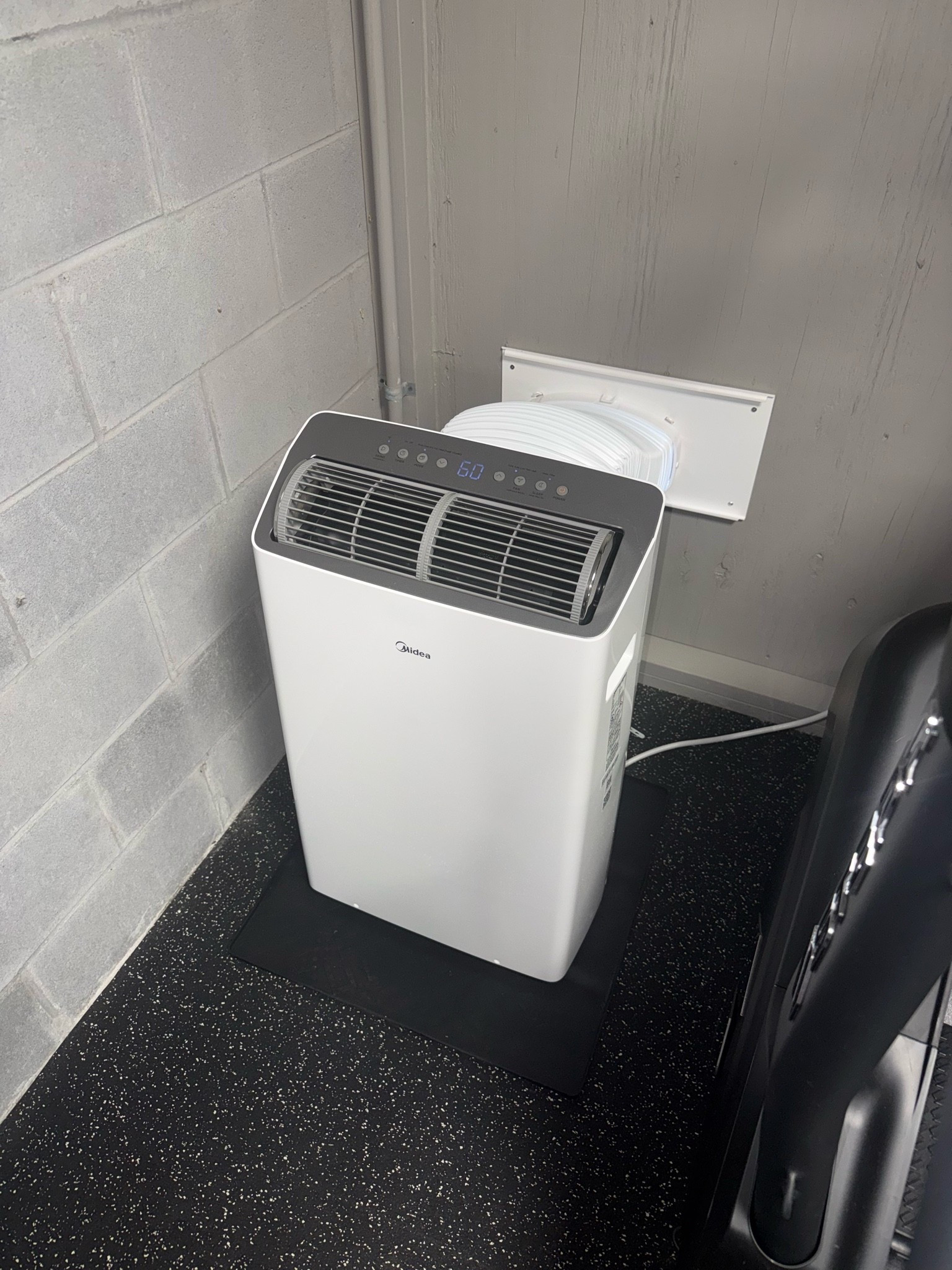 My saving grace in this southern heat. 🥵☀️
A portable A/C unit in my garage gym. Best $500 (+ install) I’ve spent.

I was quoted $15,000 for a hanging mini-split system, but this keeps my studio between 65–75°F while cutting the humidity way down.

#LTKActive #LTKSeasonal #LTKfitnessgoals