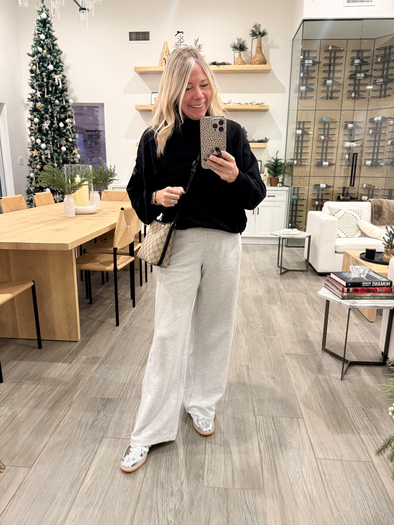 XS alo mock neck and wide leg lululemon pants. Size 7.5 silver samba sneakers. I went down a half size. Travel outfit 

#LTKTravel #LTKootd #LTKHoliday