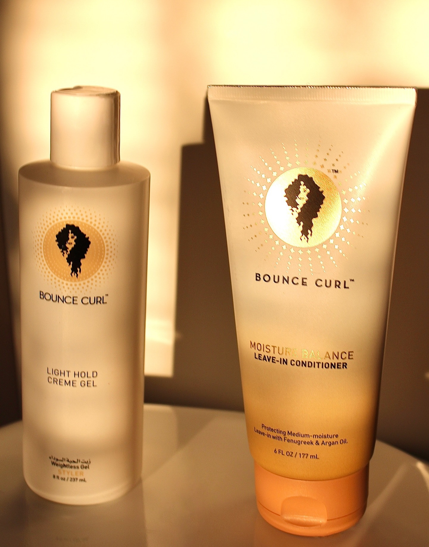 That golden hour glow on my essential Bounce Curl products...Ready for the best wash day ever!💆‍♀️🚿

Light Hold Creme Gel: Provides light, flexible hold & definition without leaving hair feeling crunchy or stiff. Gel-like, creamy consistency that helps with application & reduces frizz.

Leave-In Conditioner: Offers medium moisture for hydration, detangling, & hair protection. Contains Fenugreek & Argan Oil, known for their moisturizing & strengthening properties.

They both contain a subtle scent, which is remarkable!

@bouncecurl 

#BounceCurl #curlygirlmethod #curls #blondecurls #curlyhairproducts #hairproducts #haircare #curlyhairtips #arganoil #naturalcurls #professional #ugc #ᴘʀᴏᴅᴜᴄᴛᴘʜᴏᴛᴏɢʀᴀᴘʜʏ #bestcurlyhairproducts #tips #trending #explorepage #curllove