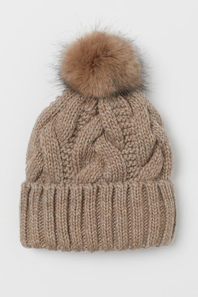 Cable-knit hat in a soft wool blend. Faux fur pompom at top and sewn, foldover cuff. | H&M (US)