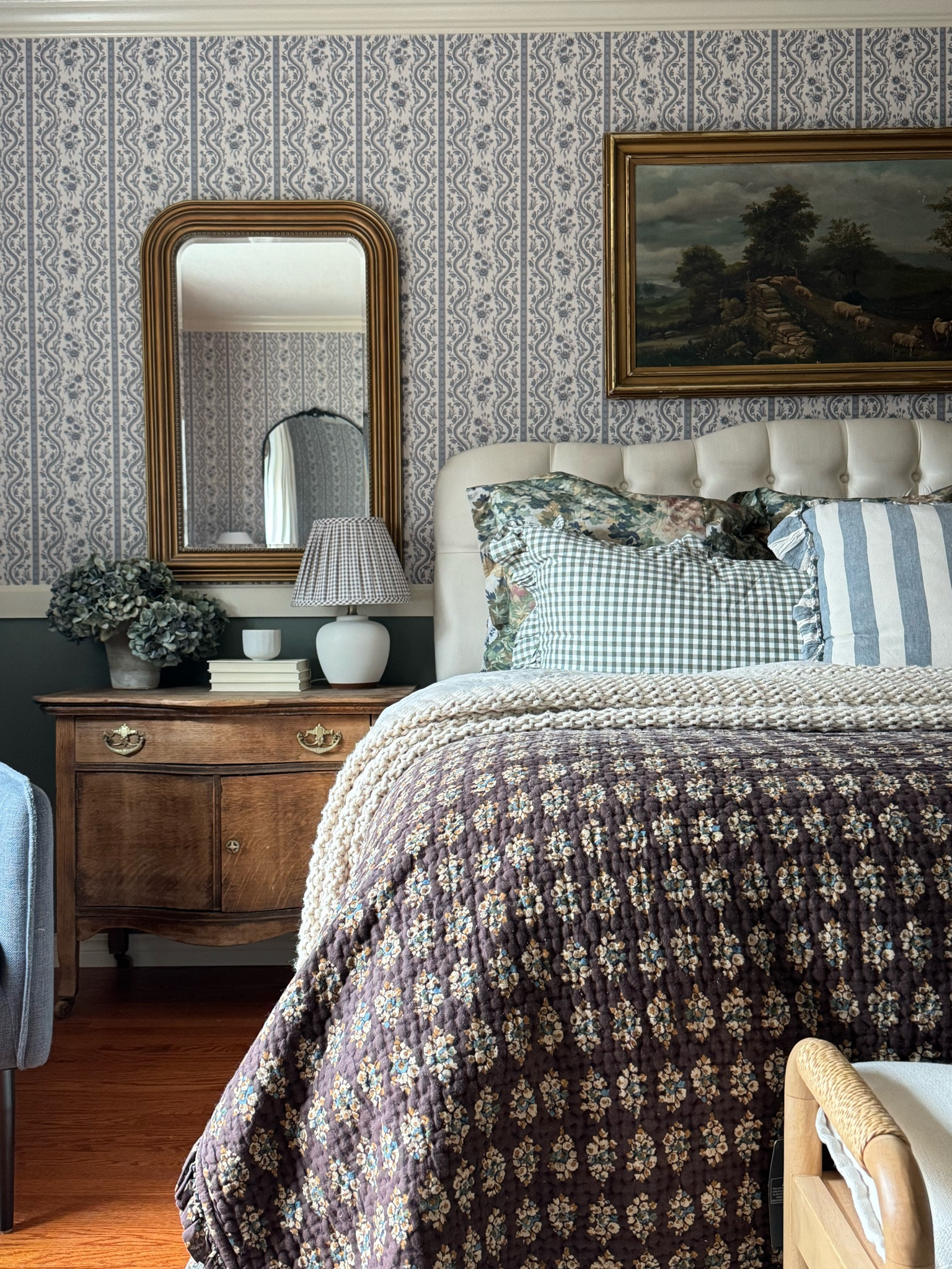Pattern play, mix and match fabrics, layered bedding, cottage bedroom, peel and stick floral wallpaper, blue wallpaper, gingham shams, ruffled shams, Pottery Barn euro shams, gingham table lamp, gold mirror, linen duvet cover, bedroom inspo

#LTKHome #LTKSpringSale #LTKSaleAlert