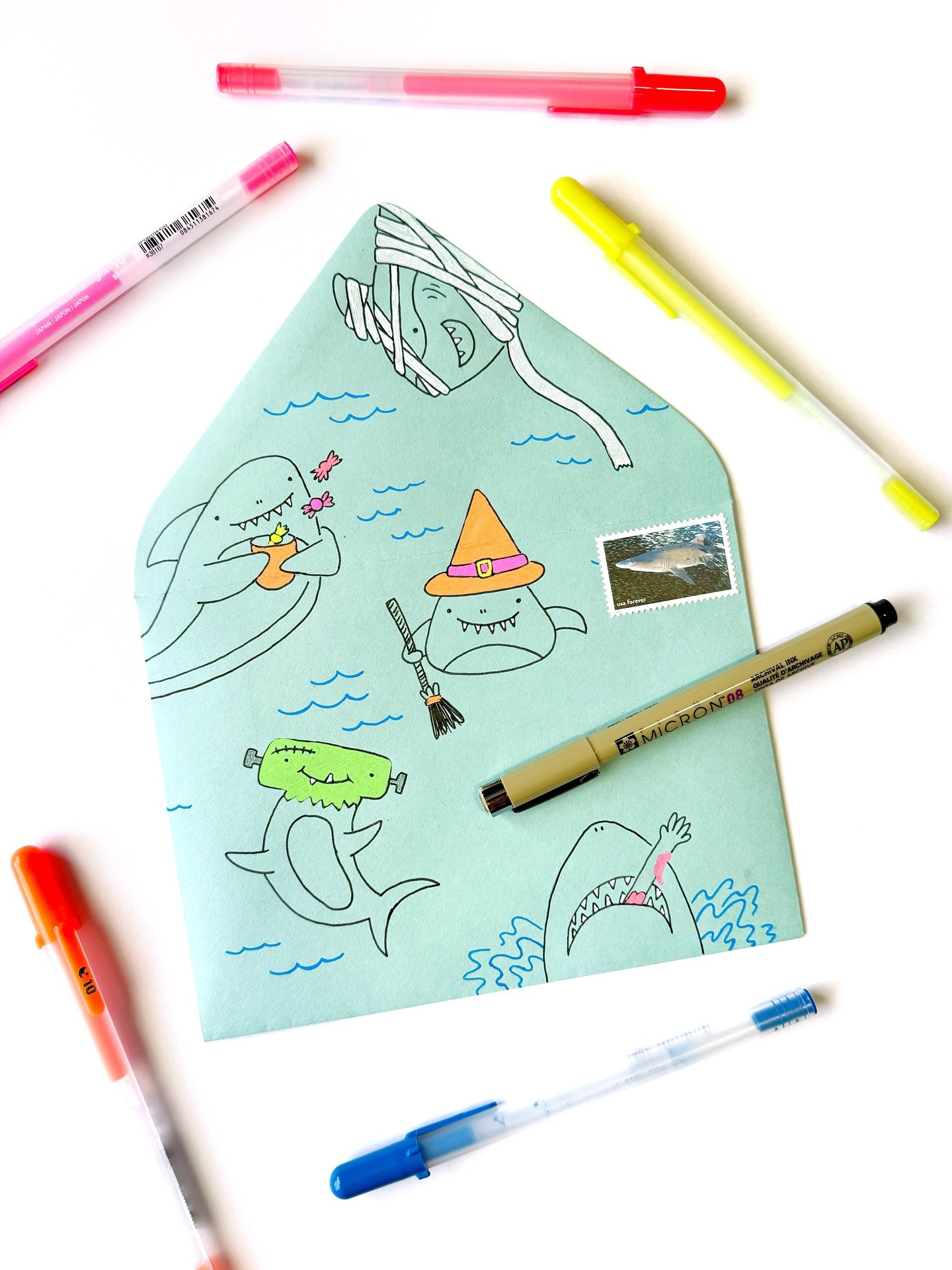 Day 19: Sharks 🦈🧹🍬

These sharks are ready to go trick-or-treating! Which one is your fave?

🖊️: @sakuraofamerica Gelly Roll pens and Koi Coloring Brush pen
✉️: @papersource envelope in Pool
.
.
.
#bewitchingenvelopes #bewitchingenvelopes2025
#papersource #bewitchingenvelopes #countdowntohalloween #halloweencountdown #halloween #halloweenlove @papersource #papersource #papersourcecreativecollective #shark #sharkart #sharkartwork #sharks #gellyrollpens #gellyrollpen #sakuragellyroll #papersourceenvelope