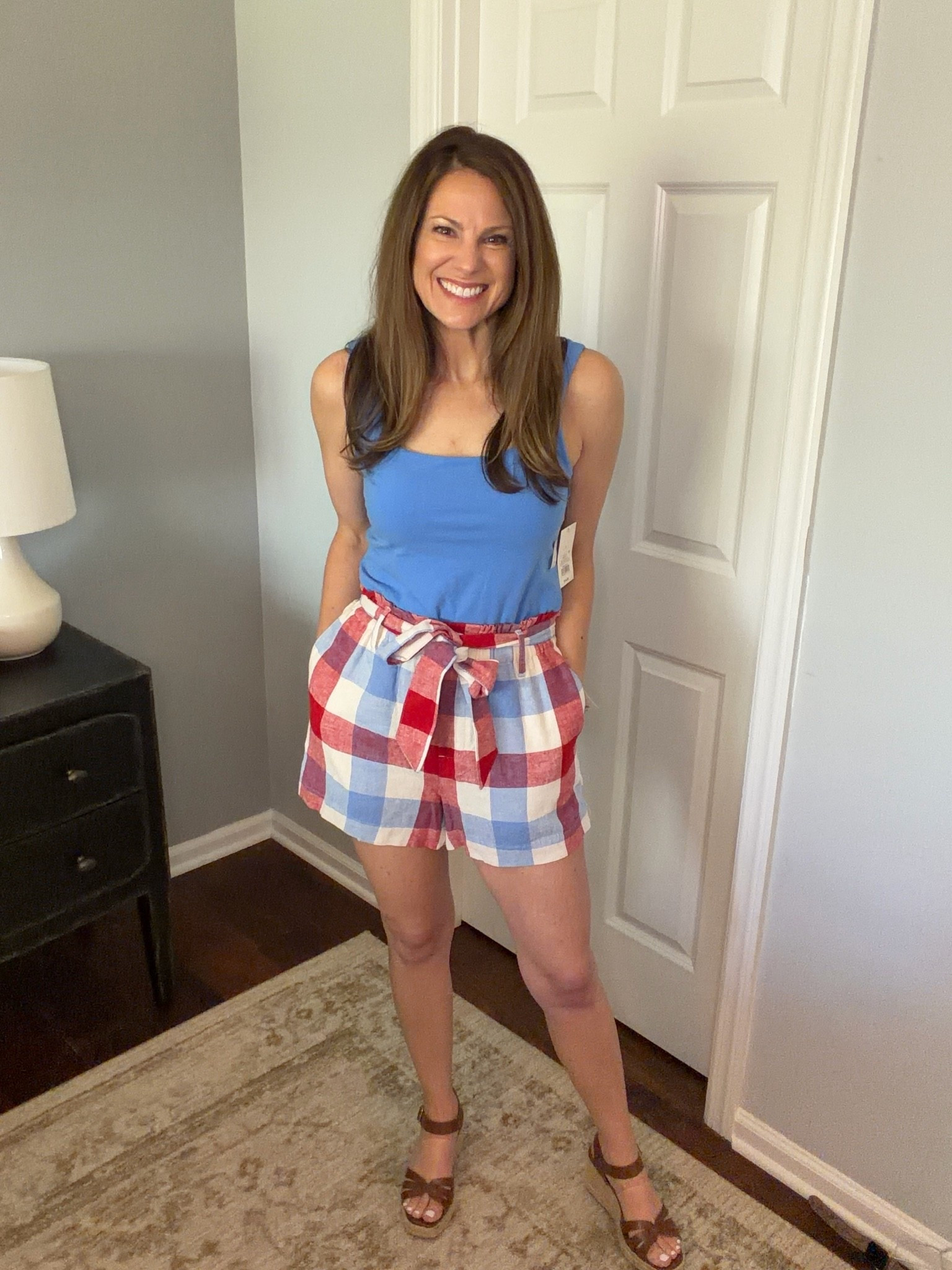 Memorial Day outfit 🇺🇸 Loving these linen paper bag shorts paired with a double lined blue tank, red white and blue plaid, and the cutest shoes for an easy summer look.

#LTKPetite #LTKMidsize #LTKootd