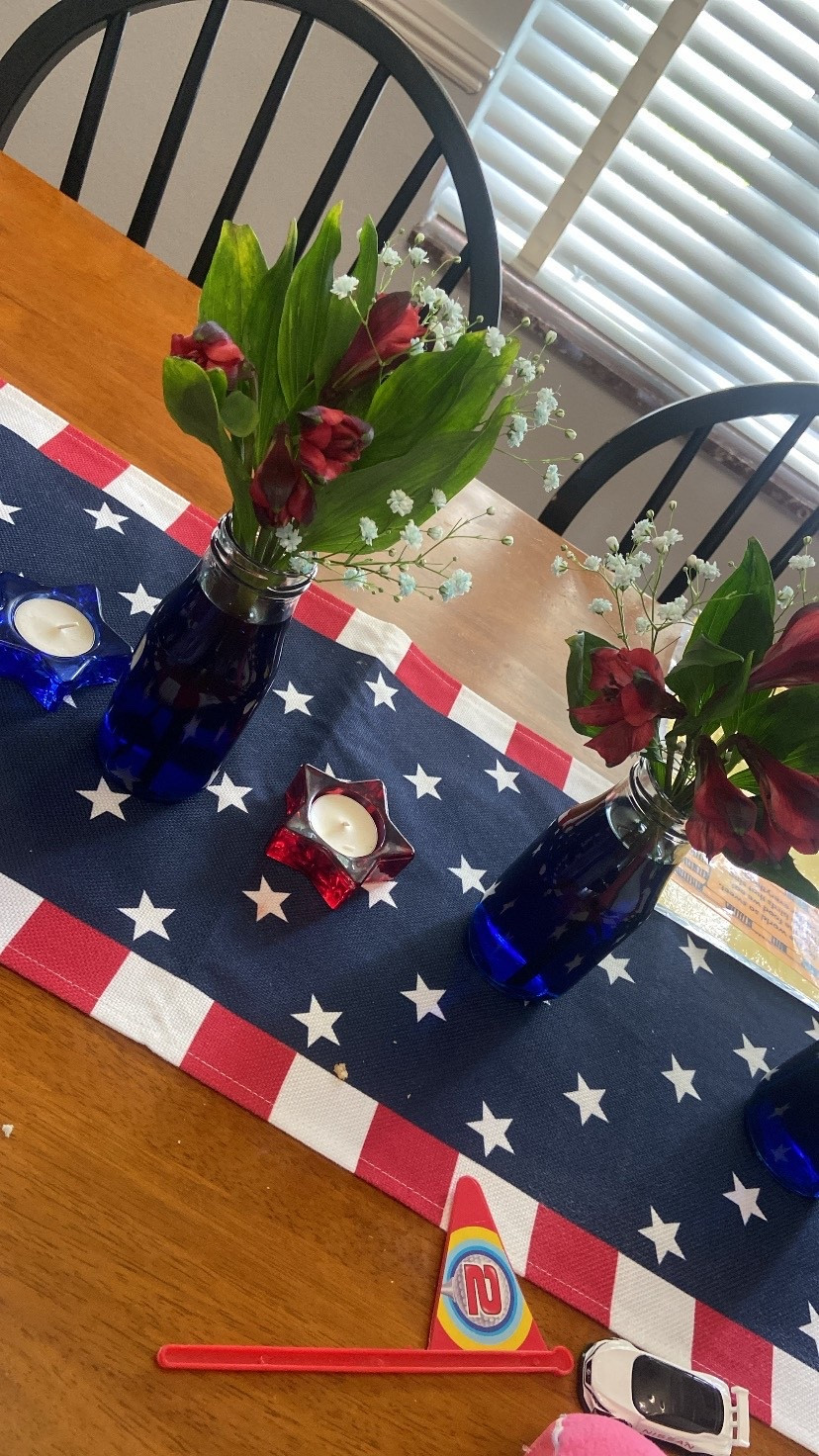 Easy Fourth of July centerpiece - add food coloring to the water; if you use white flowers they’ll change color too :) 


#tablescape #centerpiece #july4th #homedecor #flowers #fourthofjuly 

#LTKSeasonal #LTKHome #LTKParties