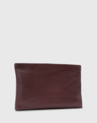 AllSaints Bettina zip leather clutch bag in burgundy | ASOS (Global)