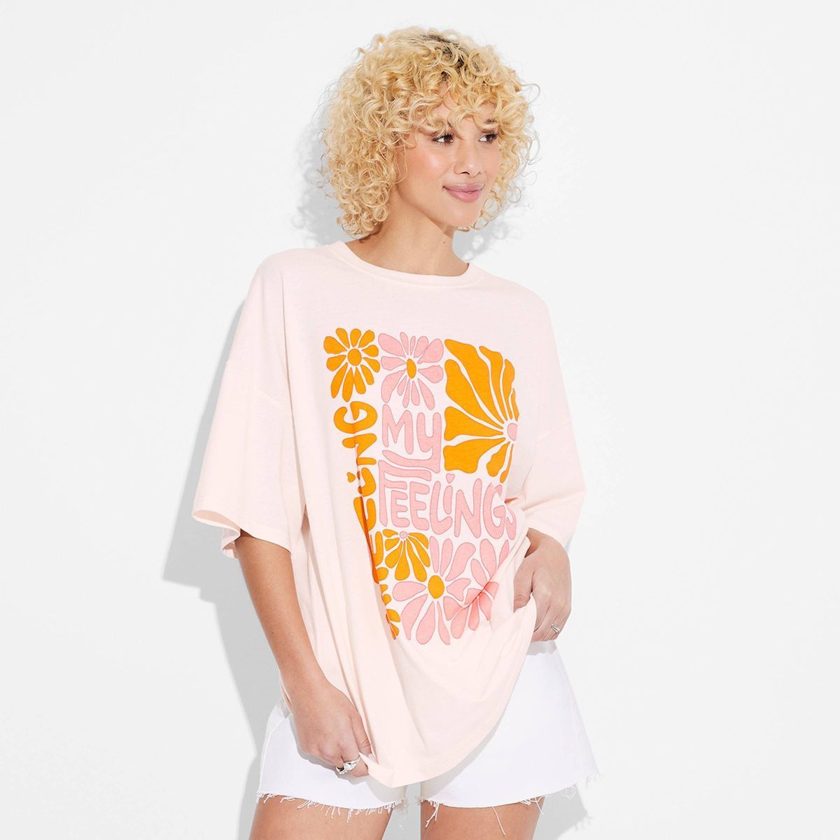 Women's Feeling My Feelings Oversized Short Sleeve Graphic T-Shirt - Light Pink L | Target