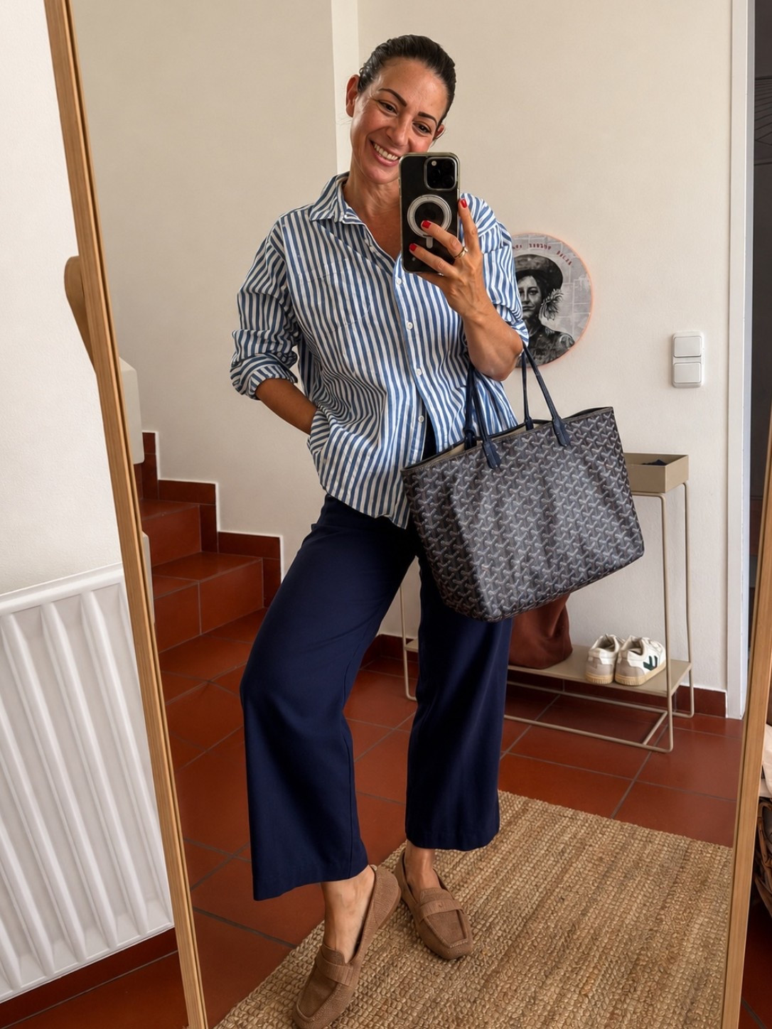 Easy and comfortable everyday outfit. 
Cropped navy linen pants, striped oversized button-down shirt, comfortable brown loafers and my most worn bag ever. 

Loafers: Vivaia
Shirt: Sézane
Pants: 
Bag: Goyard (bought it preloved on Vestiaire Collective for a fraction of the price)

#LTKgrwm #LTKmomlife #LTKOver40