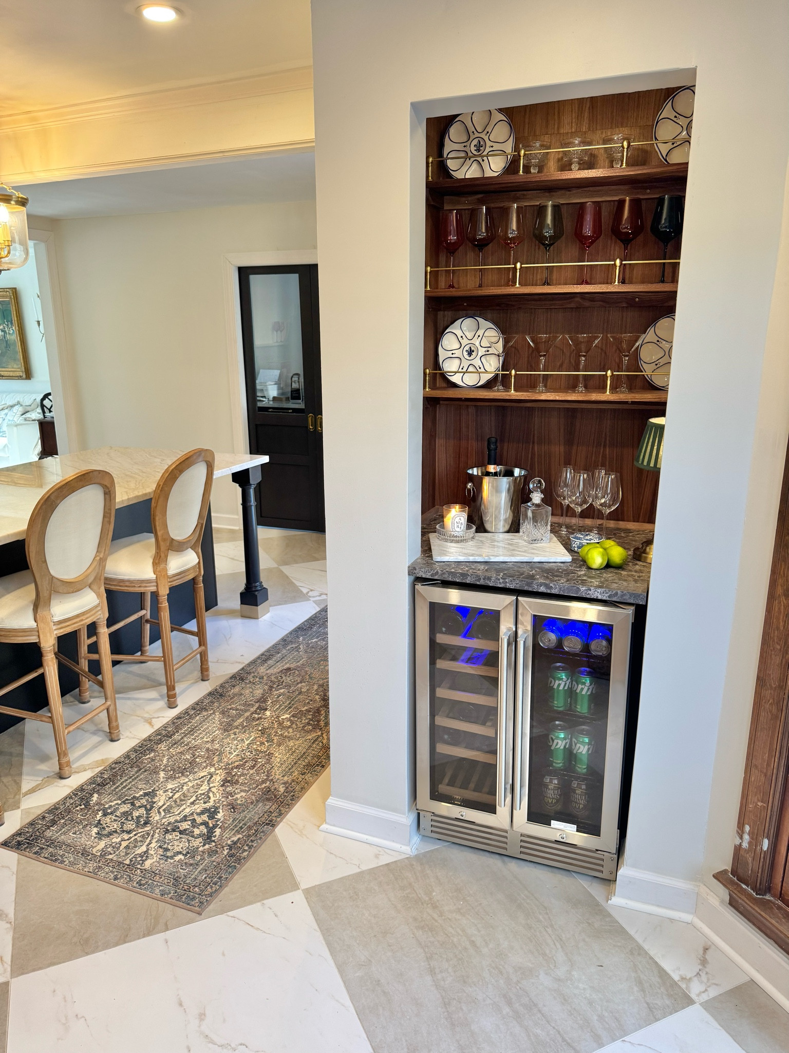 Take a look at our new wine bar and entertainment space! Wayfair had so many options for wine bar accessories, glassware, and entertaining pieces. I love this marble cutting board and the white wine glasses from their RE/FINE line.  The wine fridge also shipped incredibly quickly - it was here in just three days!  #wayfairpartner @wayfair #wayfair 

#LTKFindsUnder50 #LTKHome #LTKParties