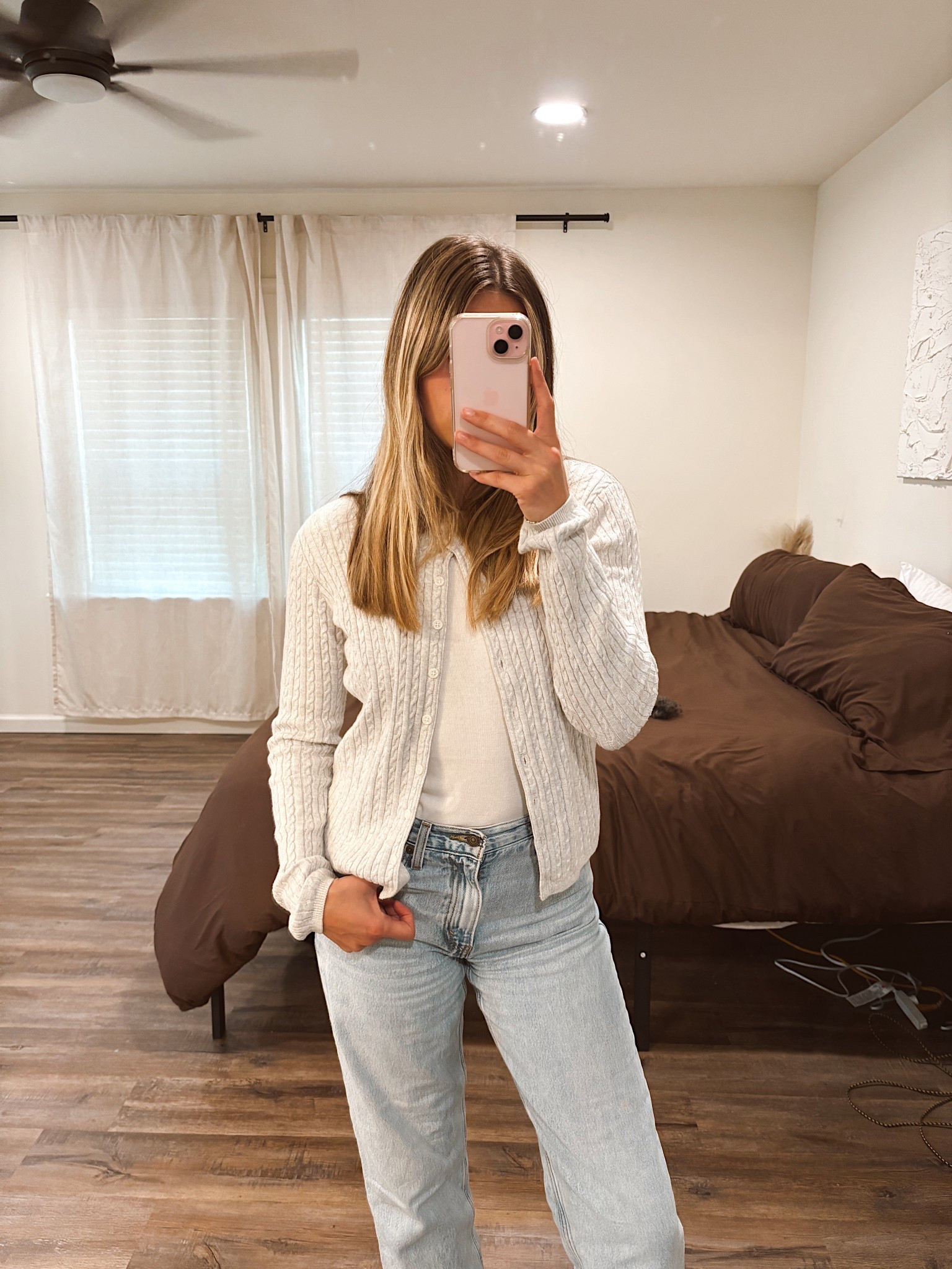 Wearing this cozy work outfit today 🤍 

Light gray cable knit cardigan and white short sleeve tee are both from Brandy Melville, super soft cotton and easy to layer when the office AC is on full blast. Jeans are Levi’s “Baggy Dad,” one of my favorite relaxed fits.

#LTKParties #LTKU #LTKPetite
