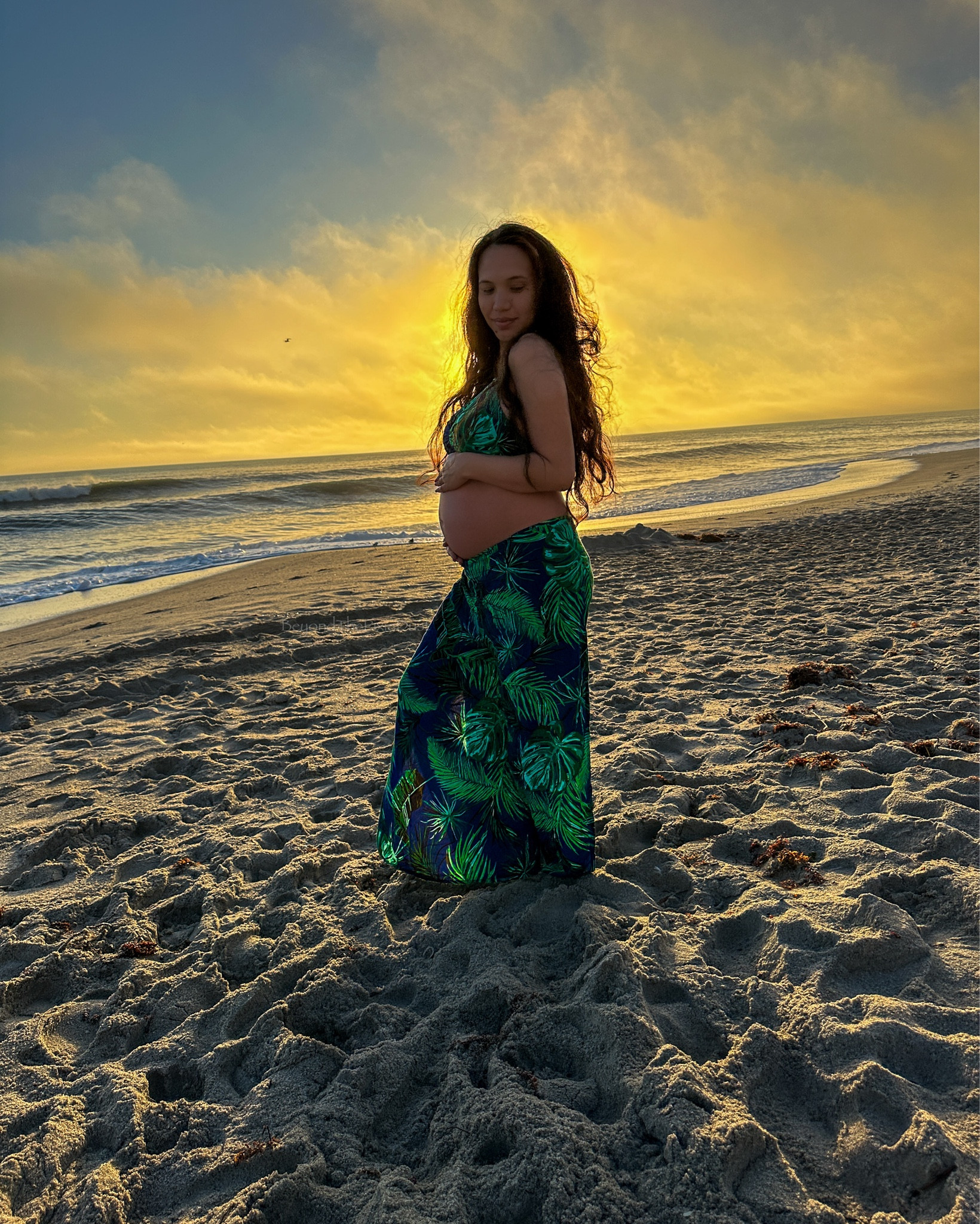 On my baby moon, I headed to the beach with my primary goal: to relax and attempt to take sunrise photos. So my boyfriend and I woke up to see no sun out for sunrise, but after we waited a bit, the sun peaked out, and we rushed down to the beach to take some photos! I wore a Hawaiian shop-made two-piece set with wrap pants and a marching top perfect to showcase the bump and wear at any size. When not pregnant, I wear the pants high rise, but with the bump, I made it low rise. I linked a few prints from a Hawaiian local Etsy shop and similar items to recreate this look on your own! It is also a perfect vacation resort outfit! It was perfect for me to share the news of my SONshine and take some bump photos!

#LTKBump #LTKBaby #LTKTravel