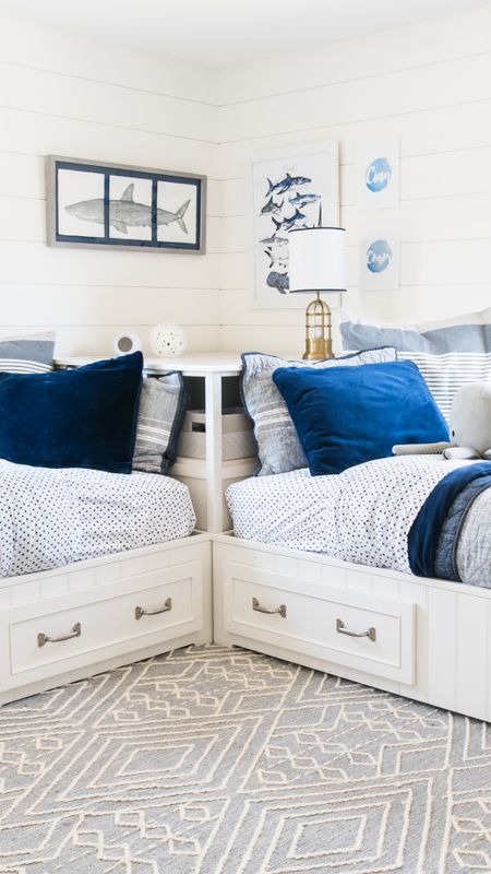 Shared boys bedroom with Pottery Barn storage beds, blue and white bedding, nautical themed, area rug, coastal style bedroom decor for kids room

#LTKfamily #LTKhome #LTKkids