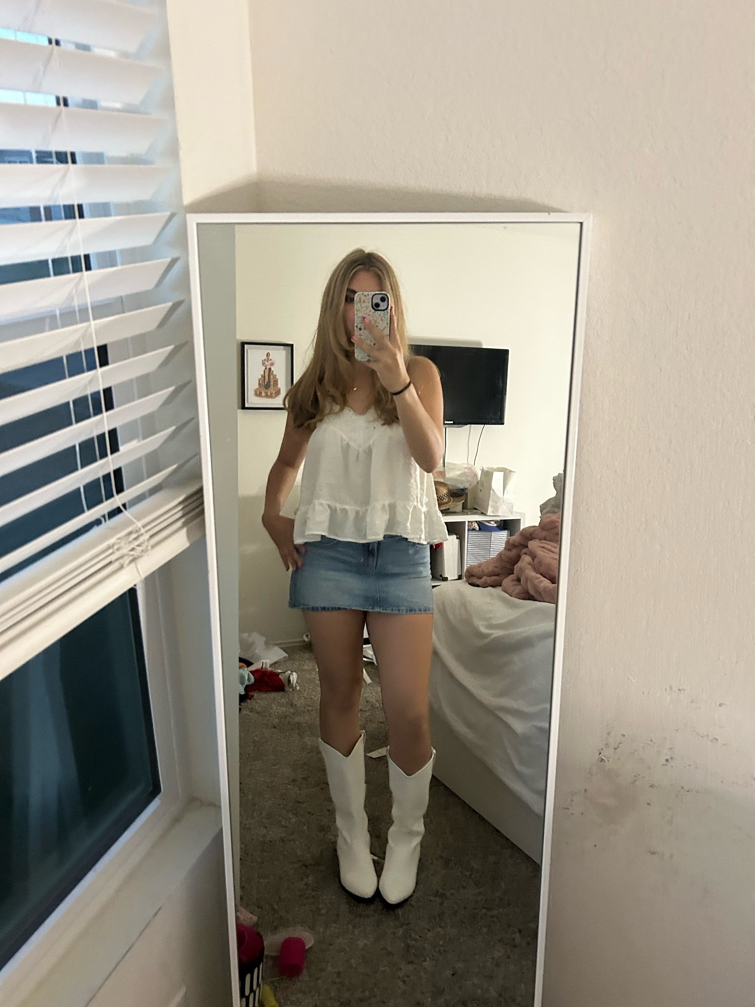 Cute and simple going outfit inspo! I love wearing my white boots with my jean skirt :)

#LTKdayinmylife #LTKootd #LTKgrwm