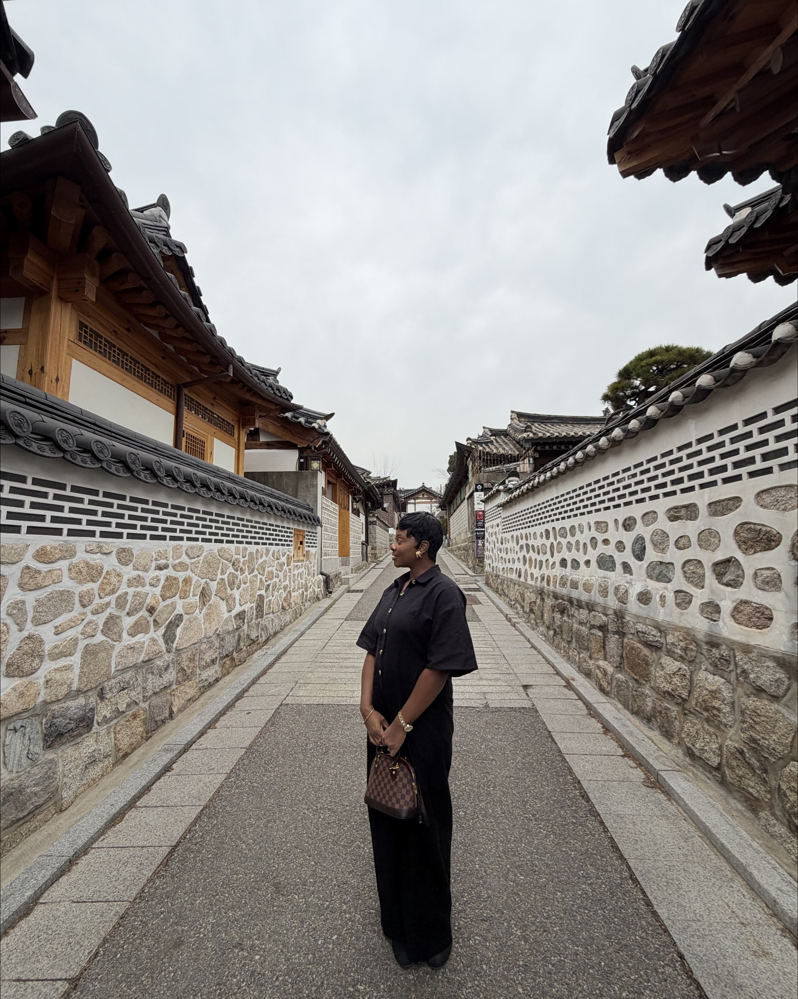 Perfect Black jumpsuit for exploring the city. Has a cut out in the back for even more flare  

#LTKtravel