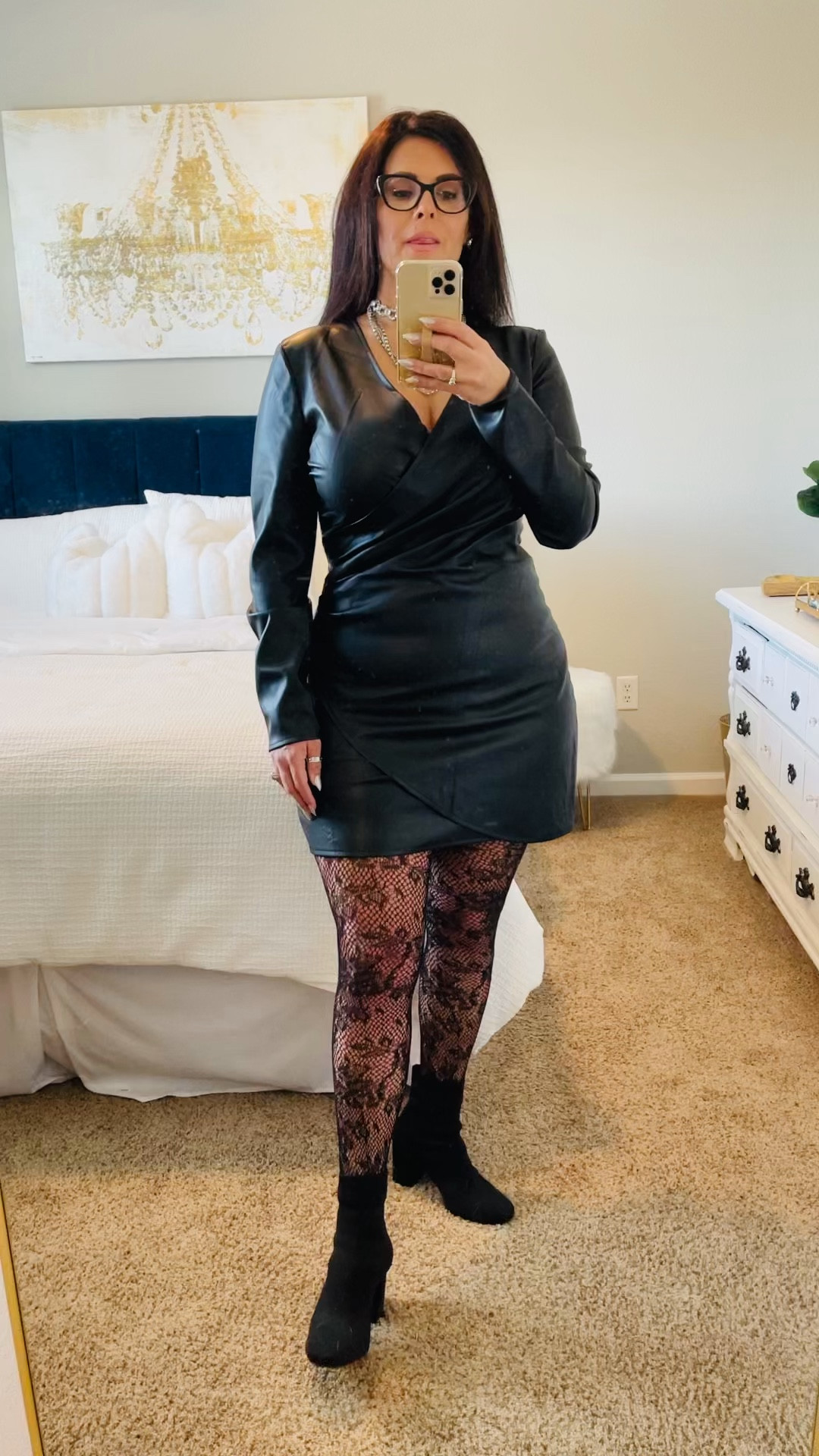 Stepping into the holiday sparkle with a touch of edge! You could be rocking a sleek black leather Steve Madden dress, lace tights, silver booties, and a dazzling mesh purse. Ready to slay the holiday party or own the dance floor on New Year's Eve! #HolidayGlam #NYEStyle #SlayInTheSeason  #PartyReady
 #ChicStyle #FestiveFashion
#BlackLeatherDress #LaceTights
 #SilverBooties #MeshPurse #SteveMadden
#ChristmasOutfit #NewYearsEveLook



#LTKHoliday #LTKmidsize #LTKstyletip