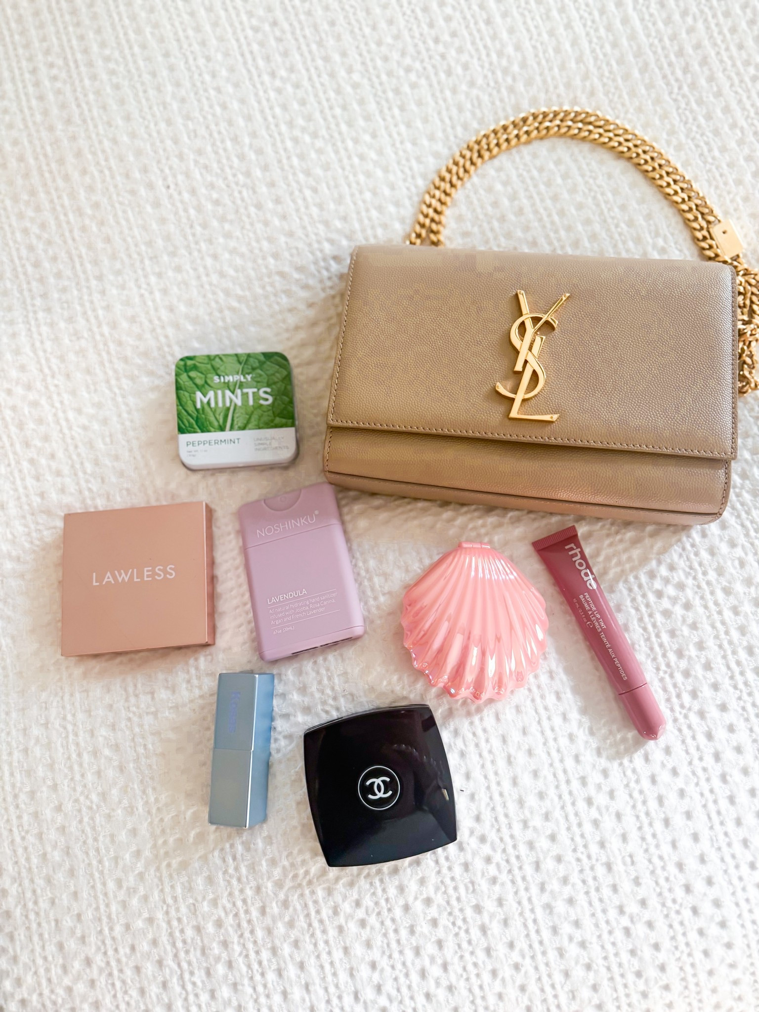 What’s in my bag for church! Love this lipstick (Rosewater) and peptide glossy always carry these mints! Chanel double sided mirror. Lawless foundation. Love this compact hand sanitizer. 

#LTKselfcare #LTKTravel #LTKGiftGuide