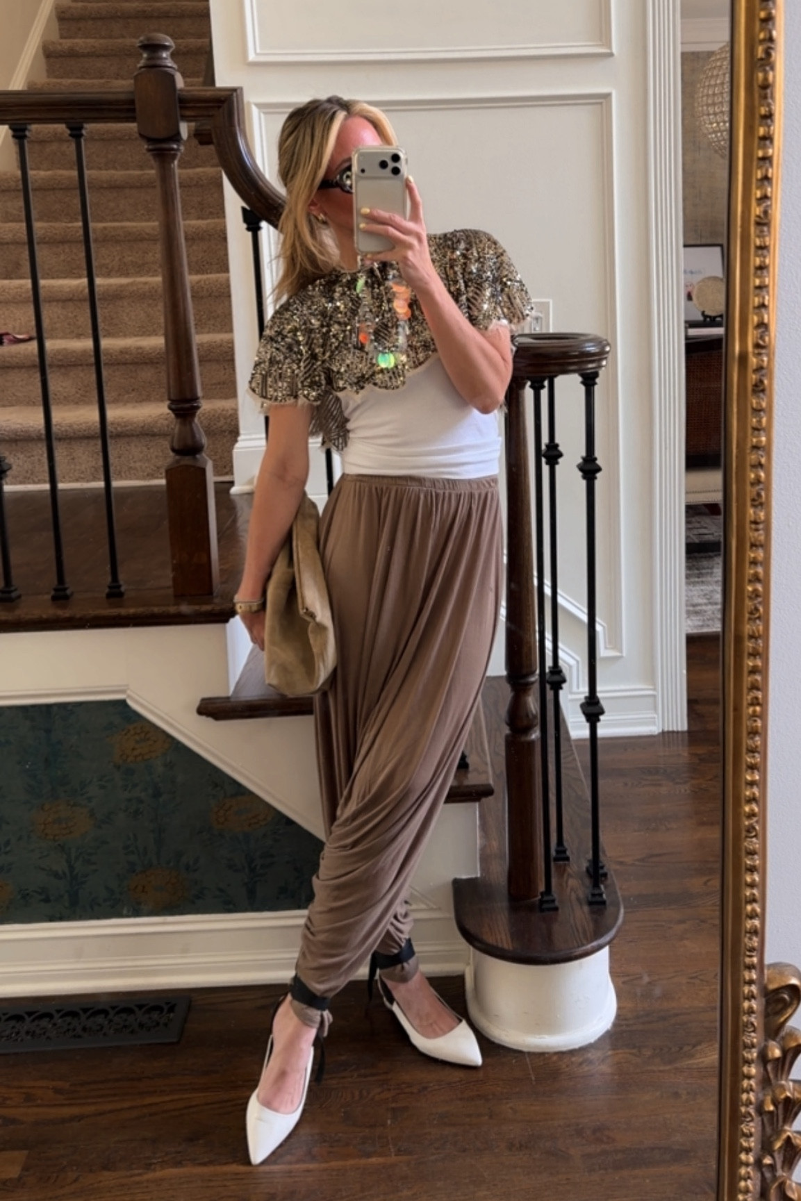 This Sequin cape is everything. Harem pants are so comfortable if you are willing to pull them off. And the perfect simple white tank. 