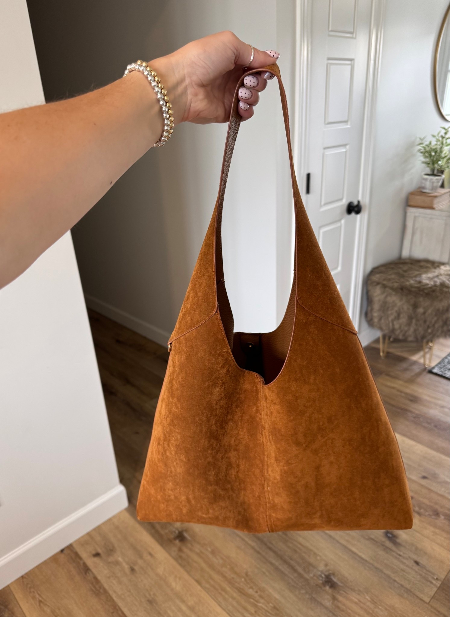 loving this suede brown shoulder bag for fall and winter. big enough to use as both a purse and diaper bag 

#LTKStyleTip #LTKItBag #LTKSeasonal