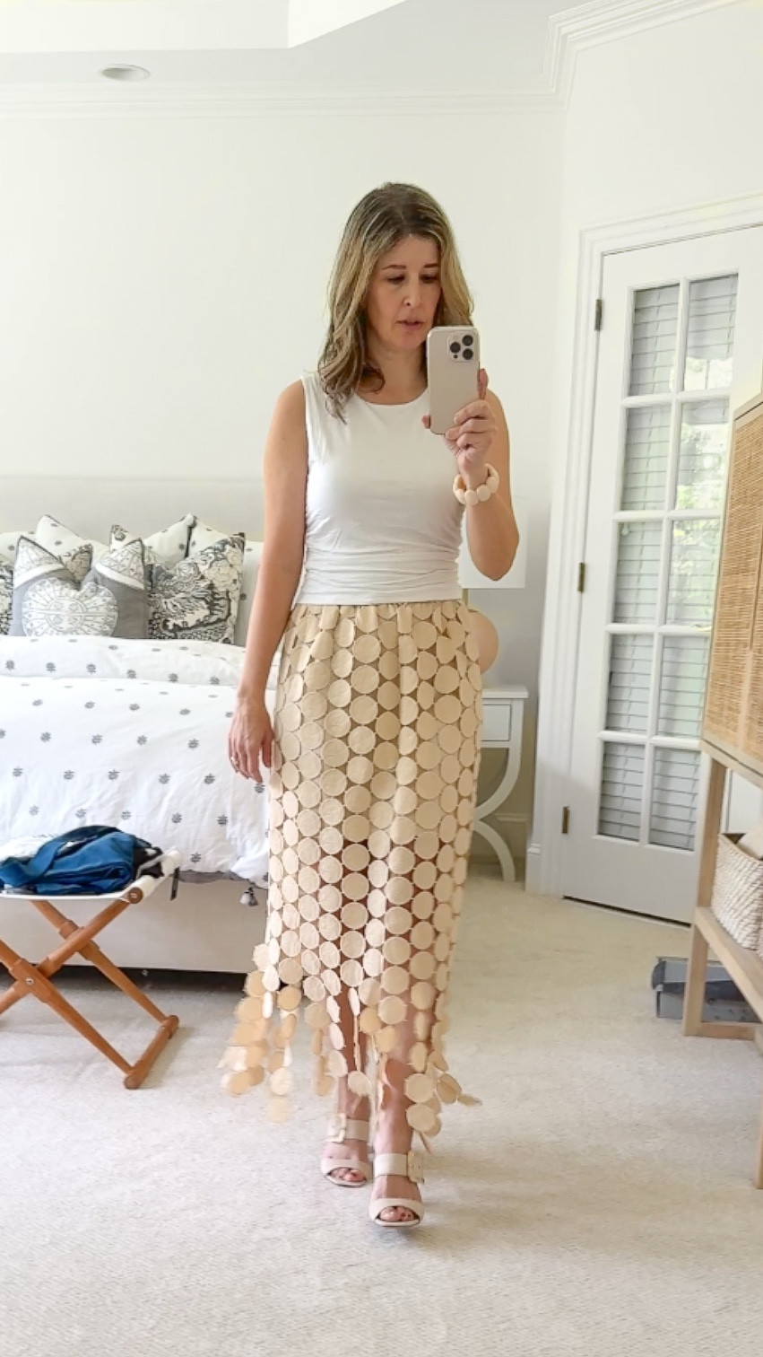 The prettiest skirt that comes in a ton of color options! This is the apricot color (size small)

#LTKPetite #LTKOver40 #LTKFindsUnder100