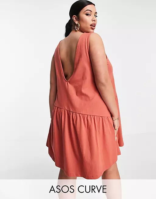 ASOS DESIGN Curve sleeveless smock dress with v back in rust | ASOS (Global)