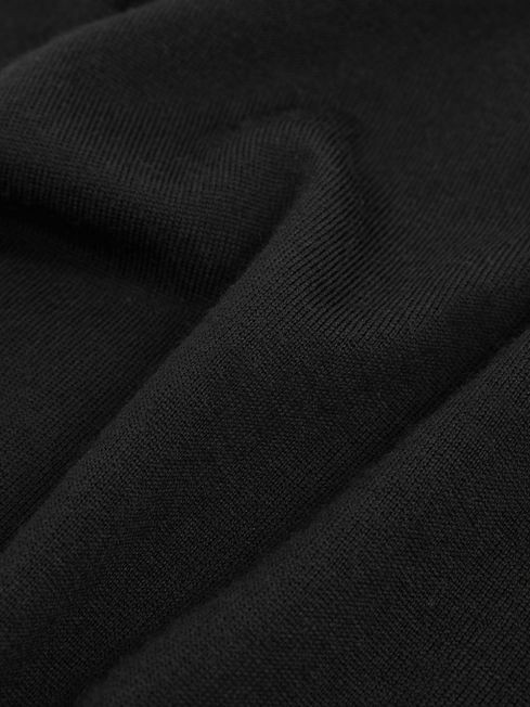 Slim Fit Merino Wool Roll Neck Jumper in Black | Reiss US