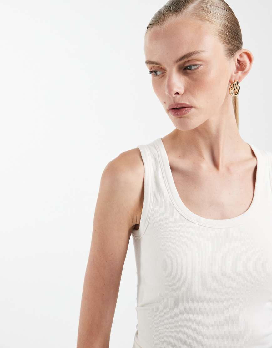 ASOS DESIGN bra-free seamless rib scoop neck tank top in cream-White | ASOS (Global)
