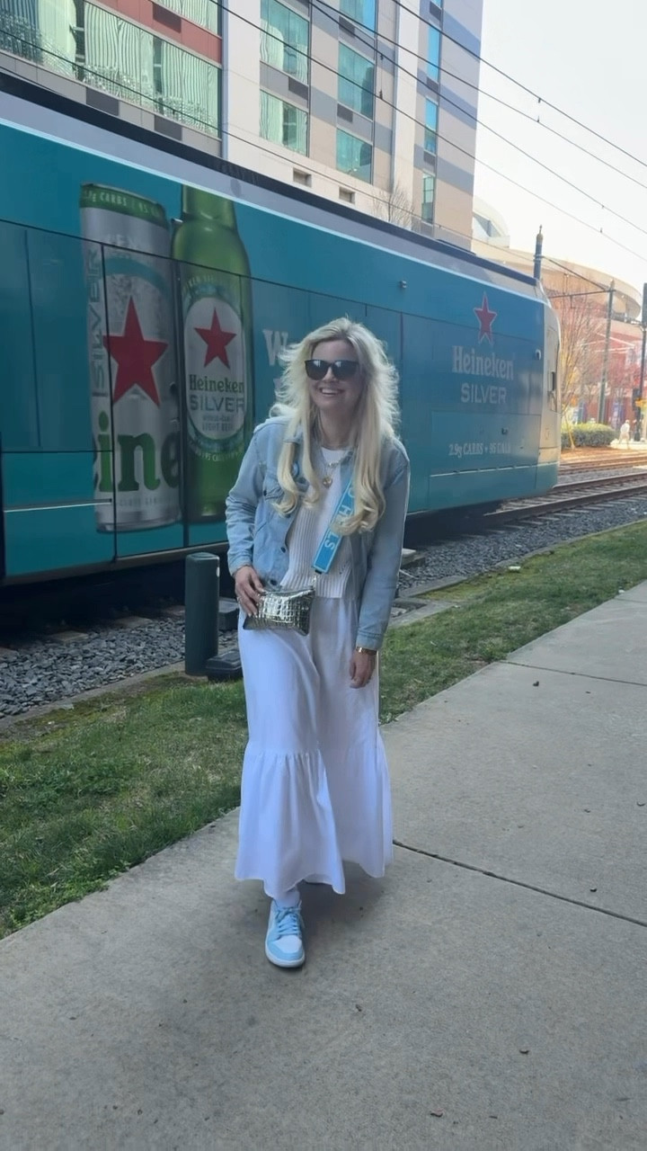 What I wore to cheer on the Tarheels - my go to spring outfit. Cute sweater tank and skirt 🩵 this exact bag strap is from shrunken head boutique 

#LTKShoeCrush #LTKWatchNow #LTKItBag