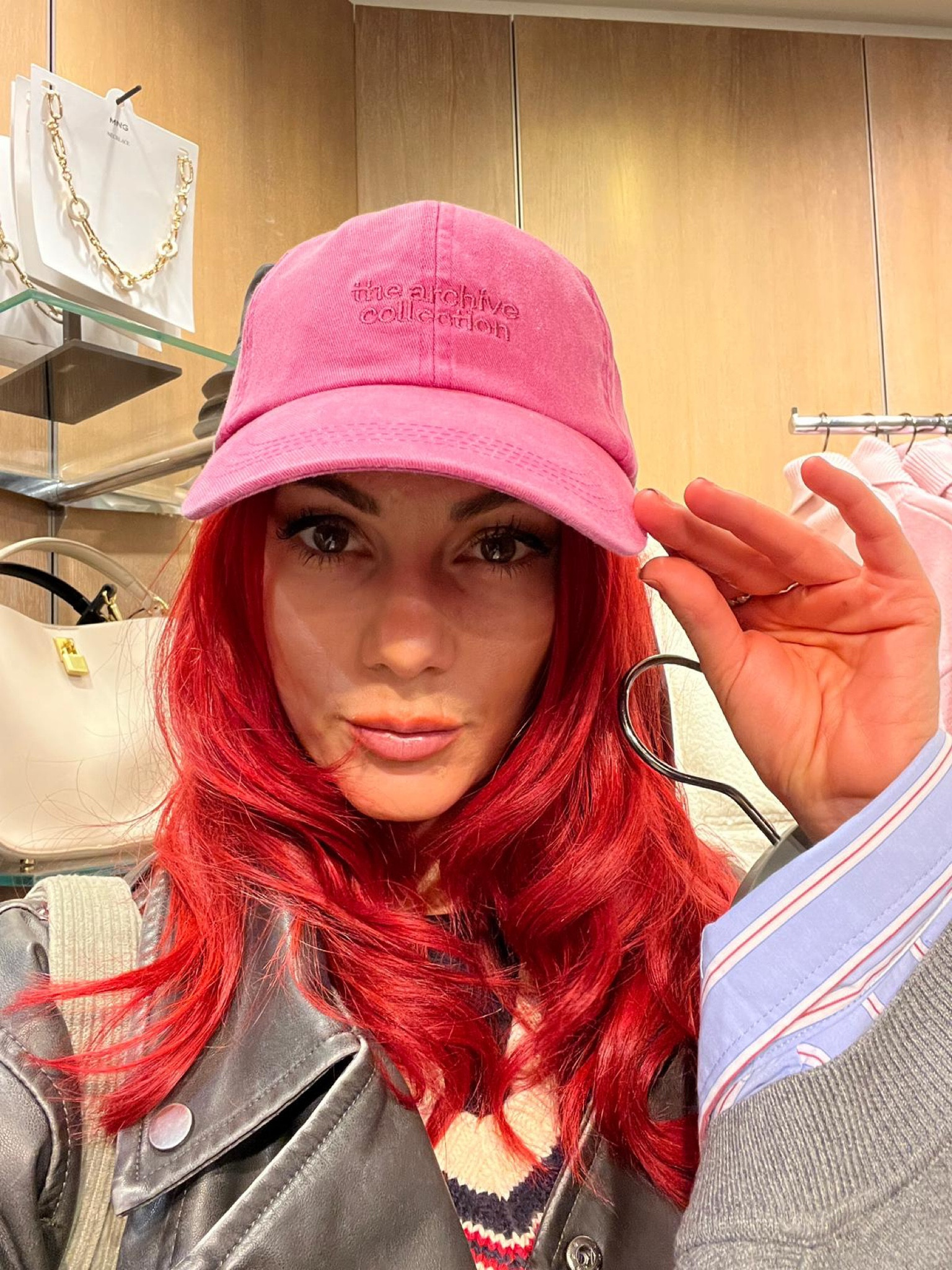Grey leather biker jacket, pink baseball hat, blue and red striped blouse

#LTKeurope #LTKstyletip #LTKSeasonal
