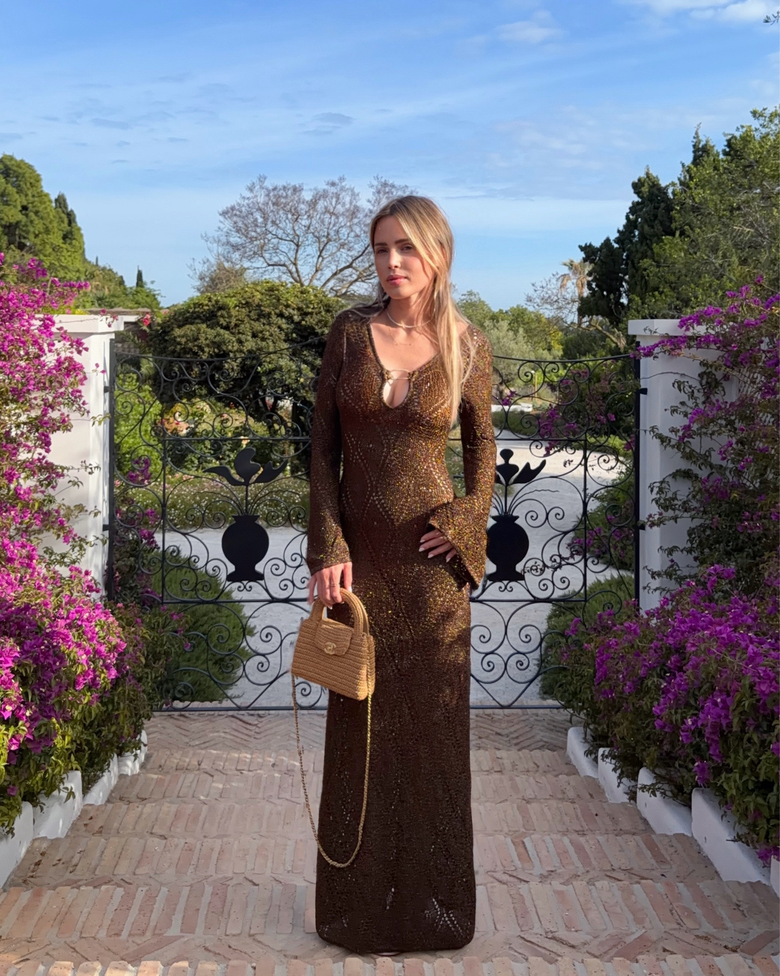 Obsessed with this brown sparkle maxi dress from @meshki! The knit texture, the subtle shimmer, and the dramatic flare sleeves make it the perfect piece for a summer night out. I’m wearing it here for dinner at the Marbella Club, and it feels so luxurious.

#LTKeurope #LTKsummer #LTKtravel