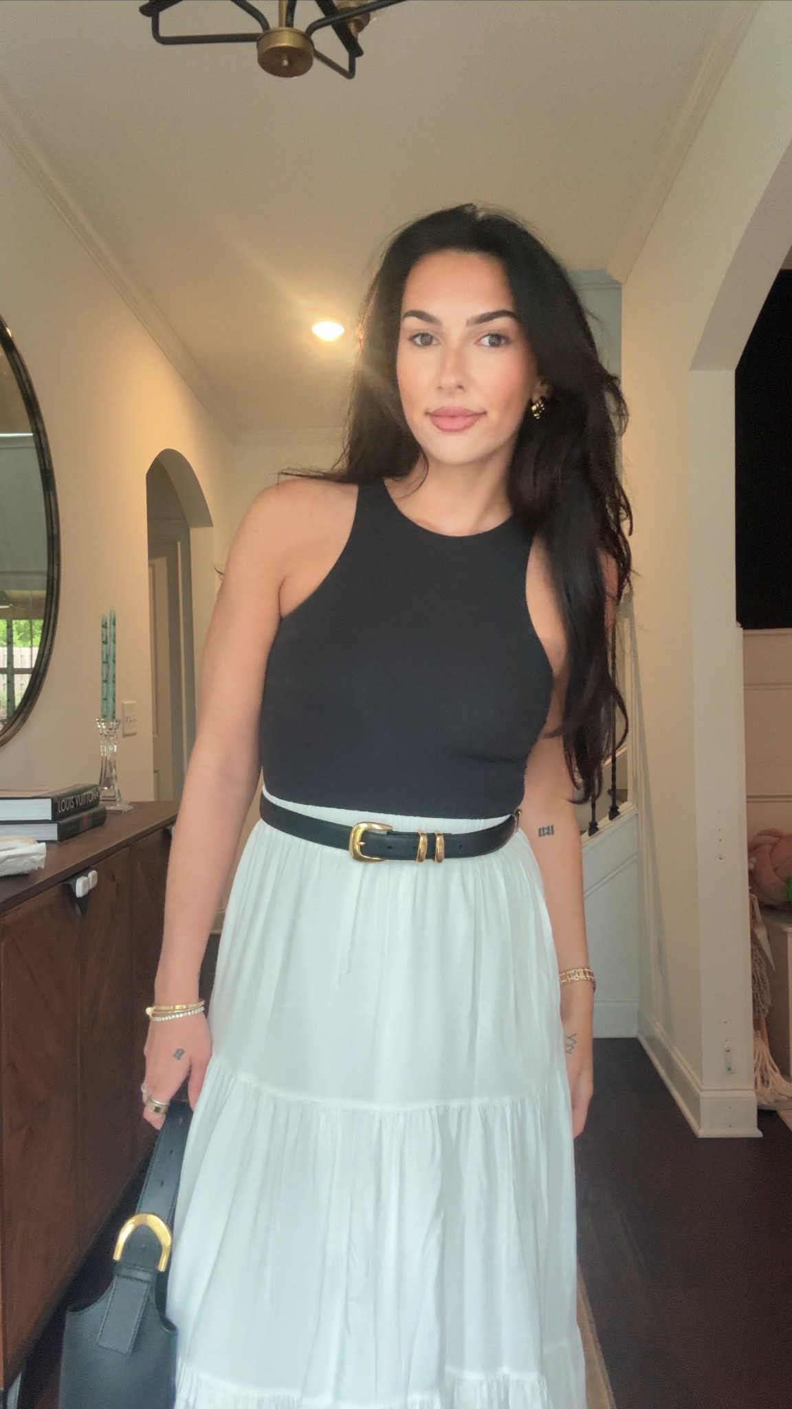 White skirt black belt gold accents black bodysuit black platform flipflop 

#LTKFindsUnder50 #LTKStyleTip #LTKShoeCrush