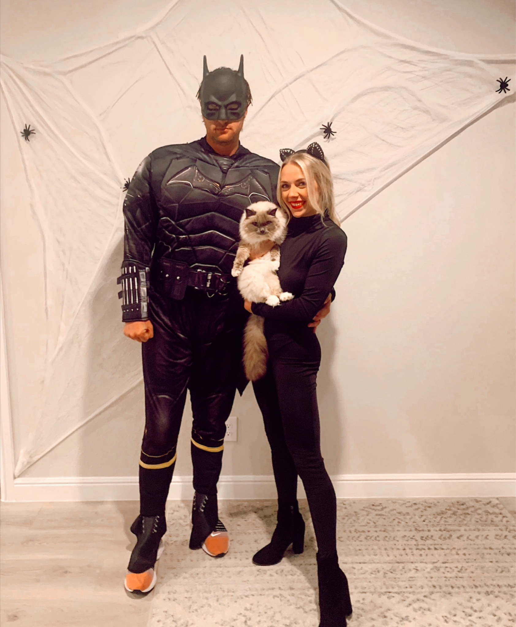 Batman, Cat woman, and her cat costume 
Couples costume easy idea 