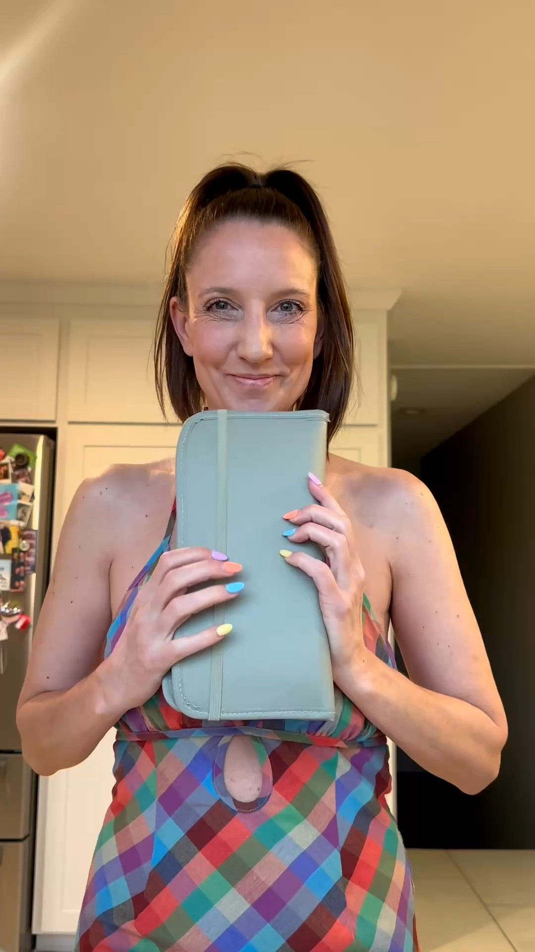 Statement patterns meet relaxed silhouettes for a polished transition from day-to-evening. 🎀🌟 This halter-neck blue gingham maxi is my secret to feeling completely put-together with zero effort. Check out the link in my bio to shop this look and refresh your own getaway rotation! 🌟 #StyleInspo #GinghamPrint #EffortlessGlam #ShopMyLook

My Preppy Plaids Style Breakdown
• The Dress: I’m wearing a floor-length halter-neck maxi dress featuring a classic blue and white gingham or check print.
• The Design: The dress includes a tiered skirt for added volume and movement, a high halter neckline, and a striking, intricate multi-loop back tie detail.
• The Accessories: I’ve styled the look with classic black sunglasses and a delicate initial necklace.
• The Footwear: I finished the ensemble with my favorite white low-top platform sneakers featuring gold and beige accents for a comfortable twist.
• The Vibe: This outfit is the definition of "polished casual"—a monochromatic, breathable look that captures a fresh summer energy.

blue gingham dress, blue check maxi, tiered maxi dress, halter neck maxi, preppy summer outfit, white platform sneakers, travel OOTD, vacation dress, effortless preppy style, monochrome blue look, LTKstyle

#LTKTravel #LTKootd #LTKHome