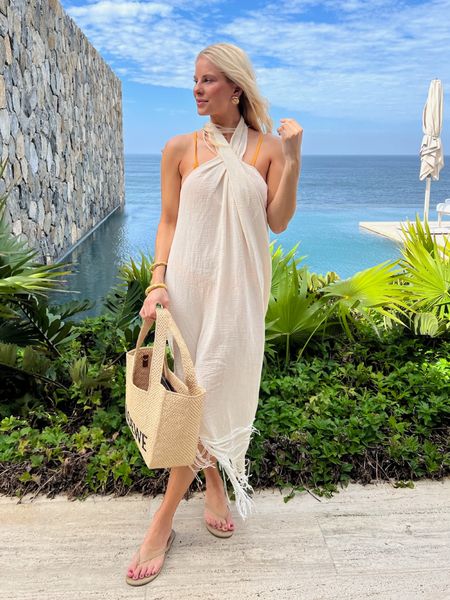 pool outfit | beach outfit | beach vacation |
Small in cover up, sandals true to size, linked similar swim… also this dress would  definitely work as a non coverup too. Just needs a slip under! I actually would have worn this for dinner but I forgot to bring a strapless or sticky bra!
#kathleenpost #vacation #beach

#LTKtravel #LTKSeasonal #LTKswim